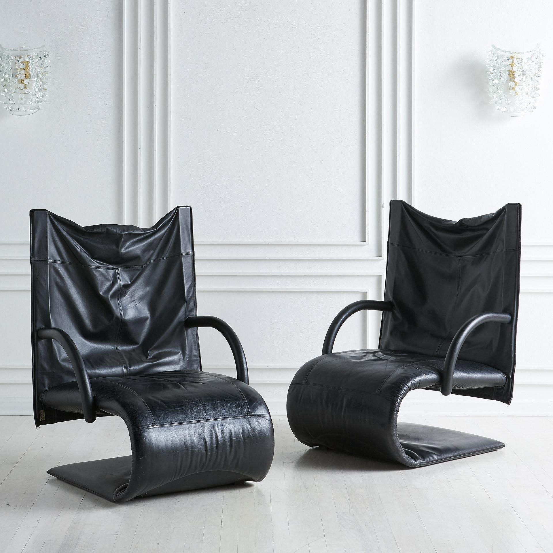 A single Zen armchair designed in 1986 by Claude Brisson for Lignet Roset;. Featuring the original black leather upholstery. A comfortable and sculptural lounge chair. 

France, 1980s.

Two pictured but only one is available.