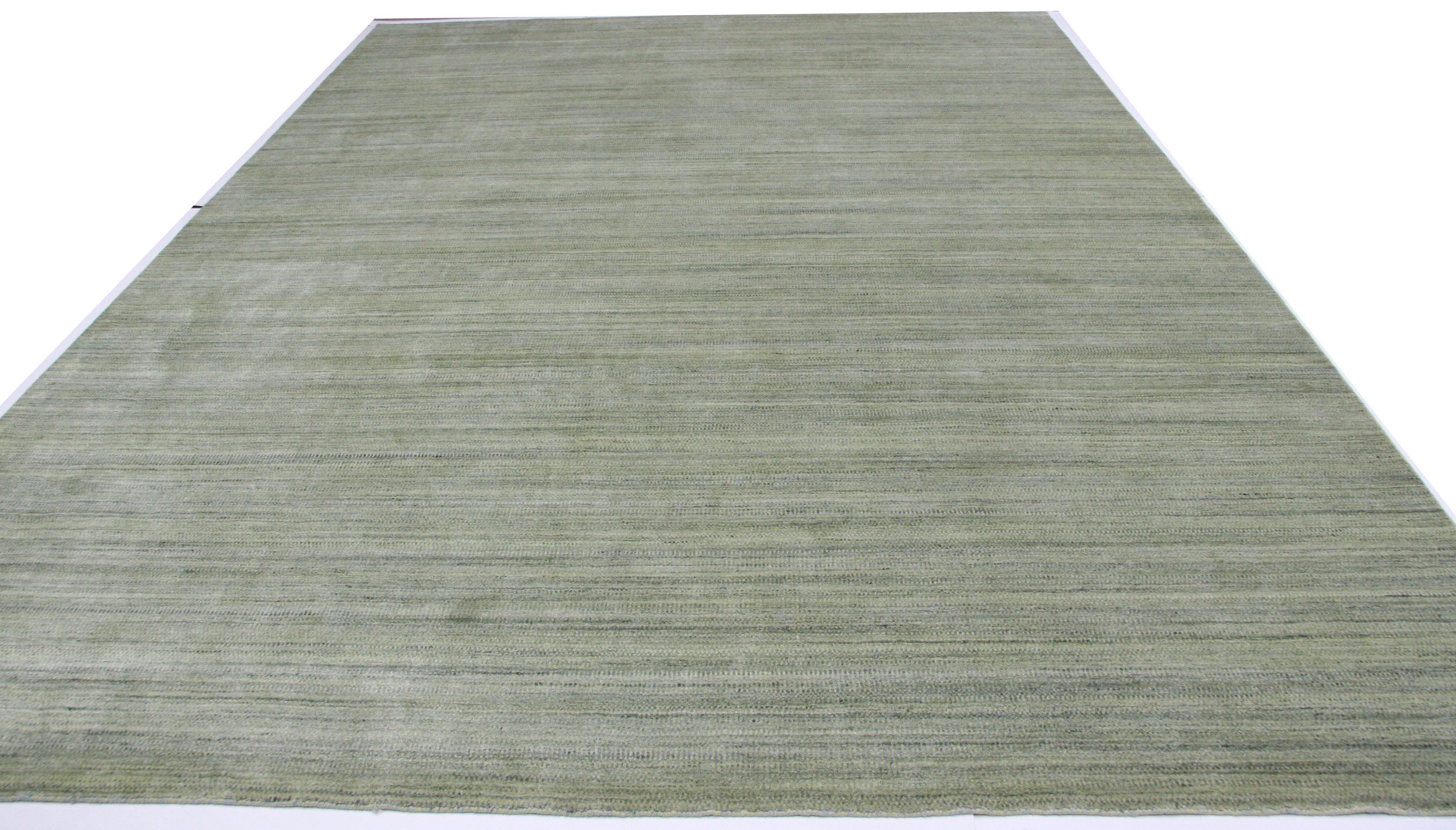 Crea un'atmosfera rilassante in qualsiasi spazio con questa variante verde e turchese della famosa collezione di tappeti Zen. Miscela di lana e viscosa per garantire comfort e durata. Annodato a mano in India. Realizzato con tinture naturali