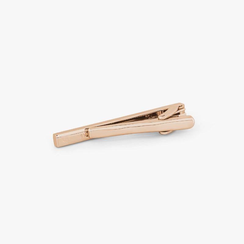 Zen Long Tie Clip with Rose Gold Finish

A thin line of our signature diamond pattern decorates the edge, creating a subtle contrast of texture. Set in highly-polished, rose gold-coloured base metal. Perfect for those who favour a minimalistic