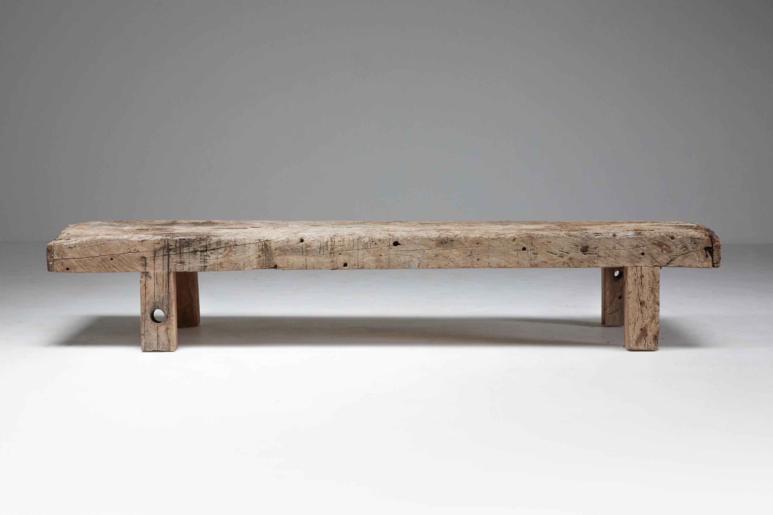 Wabi sabi, zen, rustic, primitive, coffee table, bench, France

Rustic piece full of character and patina. The wood has become very pale in color over the years reminiscing of a piece of driftwood or even stone. The wood itself is probably a few