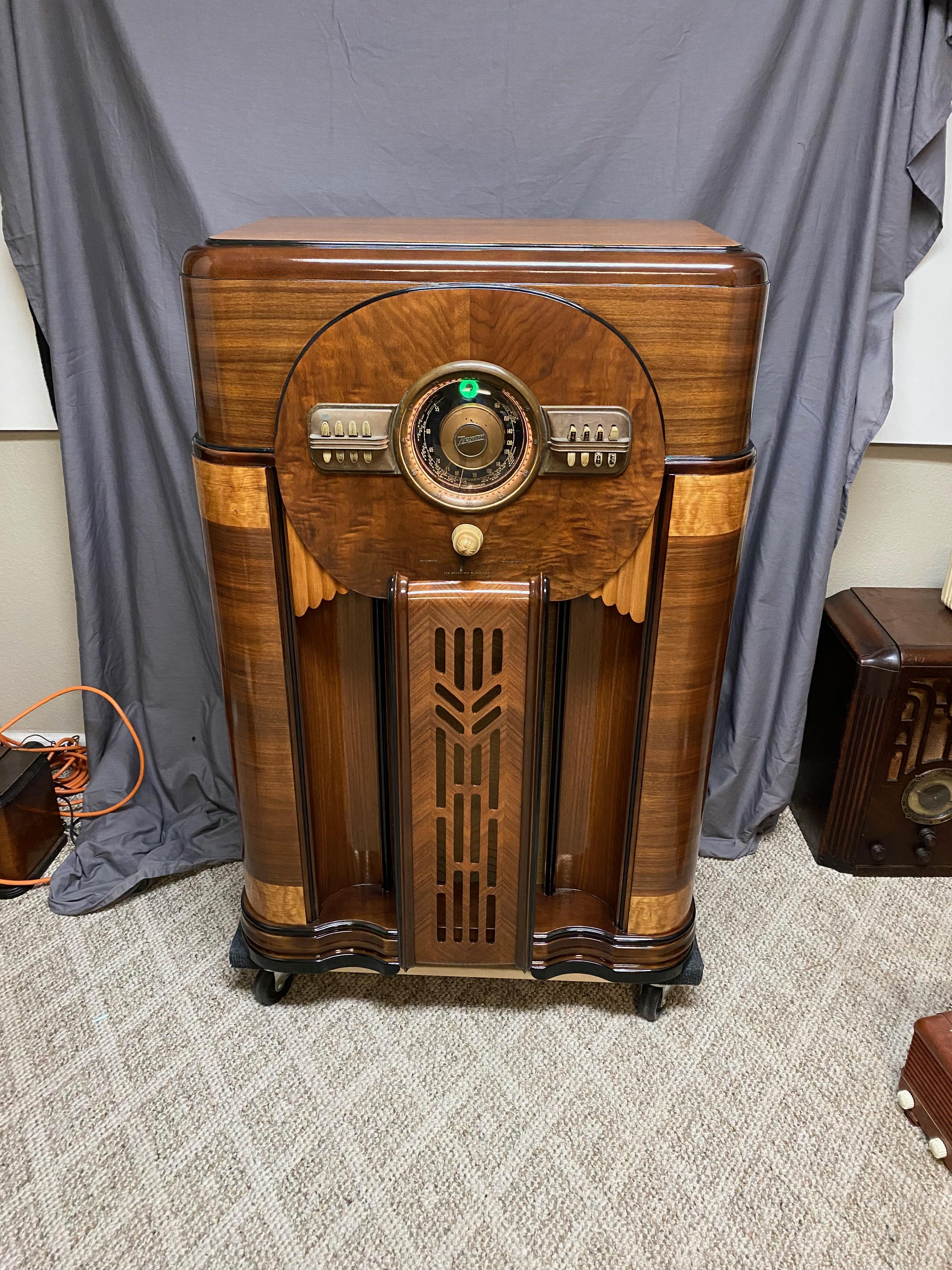 One of Zenith’s best-looking classic consoles made just before World War II in 1940. Last, of the Shutterdials, this twelve-tube radio has been completely refurbished and plays very well with strong selectivity. It has the Wavemagnet internal