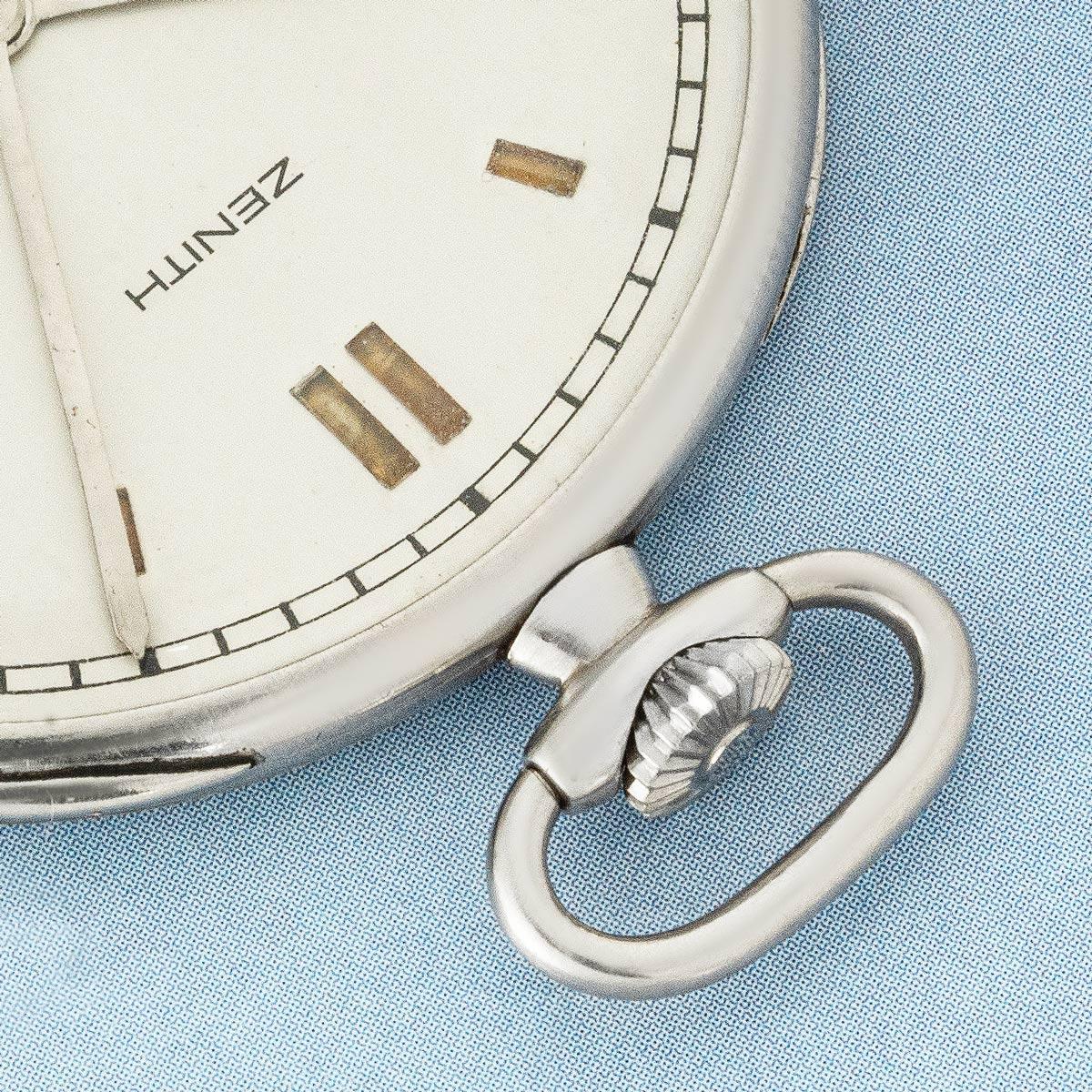 Zenith. A Rare Slim Platinum Art Deco Keyless Lever Pocket Watch, C1920.

Dial: The exquisite and rare silver dial with inlaid yellow sapphires as hour markers with outer minute track and subsidiary seconds dial at six o'clock. The elgant polished