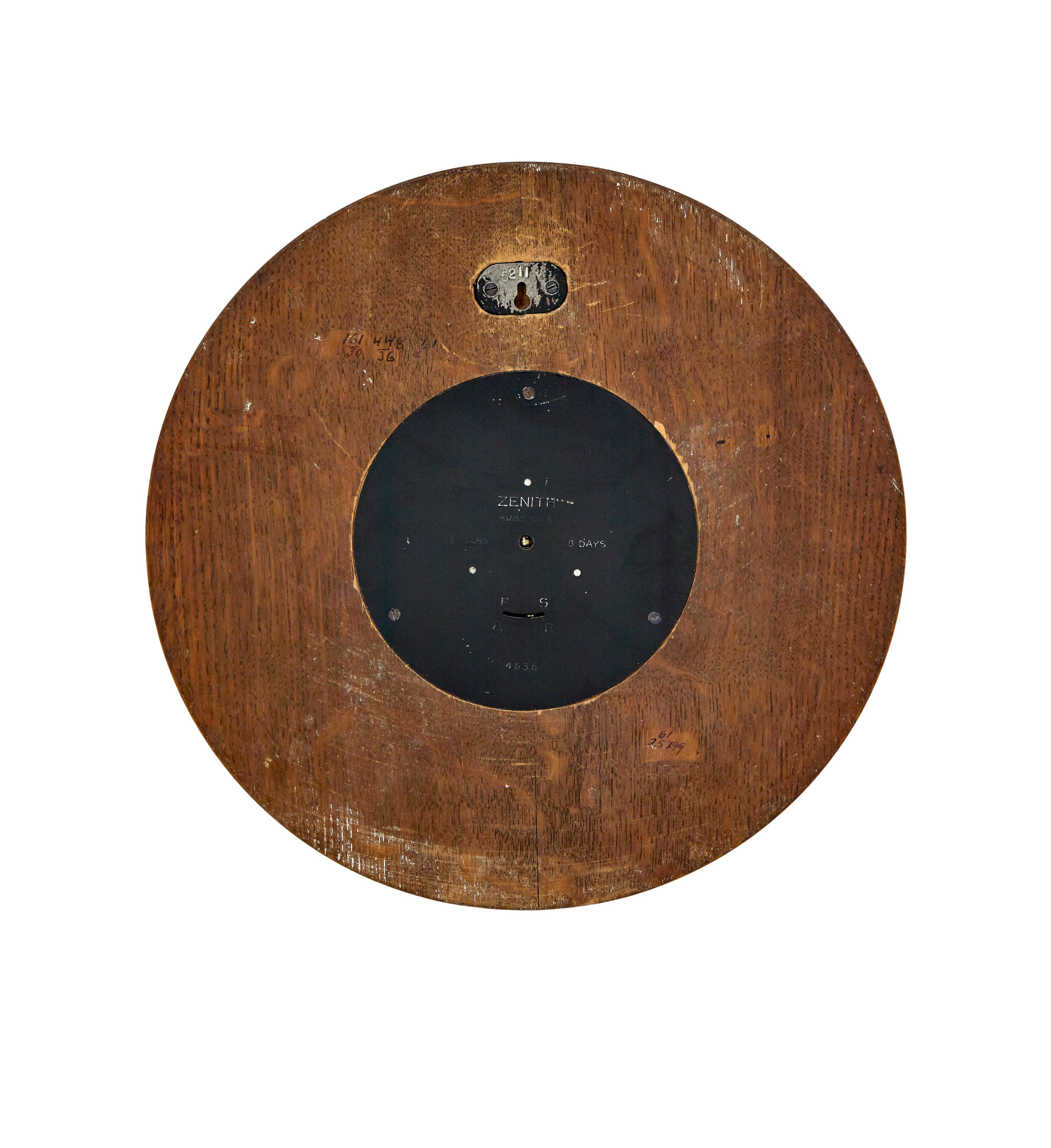 Turned Zenith art deco oak and brass wall clock