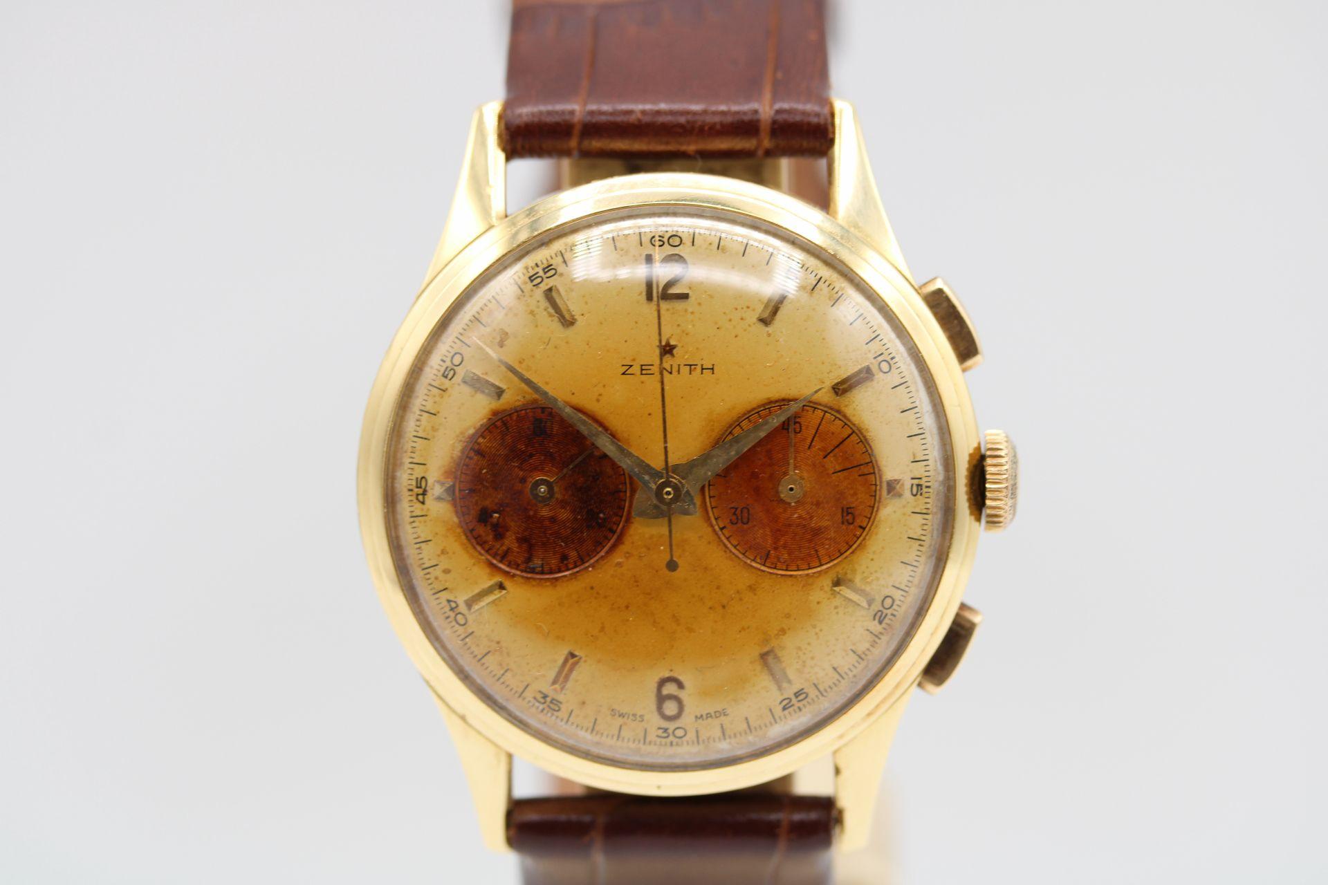 What a truly stunning vintage Zenith Chronograph that is signed throughout and in a completely unrestored and original state with the dial going a natural tropical colour in a process that can only occur naturally over time.

This watch is from the