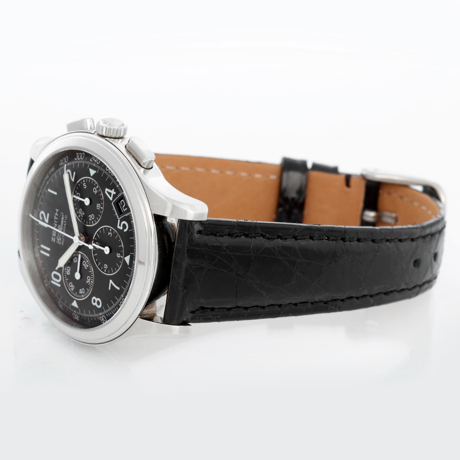 Zenith El Primero Chronograph Men's Automatic Watch - Automatic winding Caliber 400 movement. Stainless steel case with exposition back  (38mm diameter). Black dial with black date window. Genuine Crocodile Strap. Pre-owned with custom box.