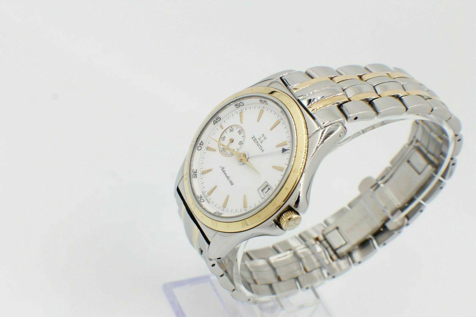 Reference Number: 53.0030.682

 

Year: 2000

 

Model: Elite 

 

Case Material: Stainless Steel 

 

Band: 18K Yellow Gold & Stainless Steel 

 

Bezel: 18K Yellow Gold

 

Dial: White

 

Face: Sapphire Crystal 

 

Case Size: 38mm

 

Includes:
