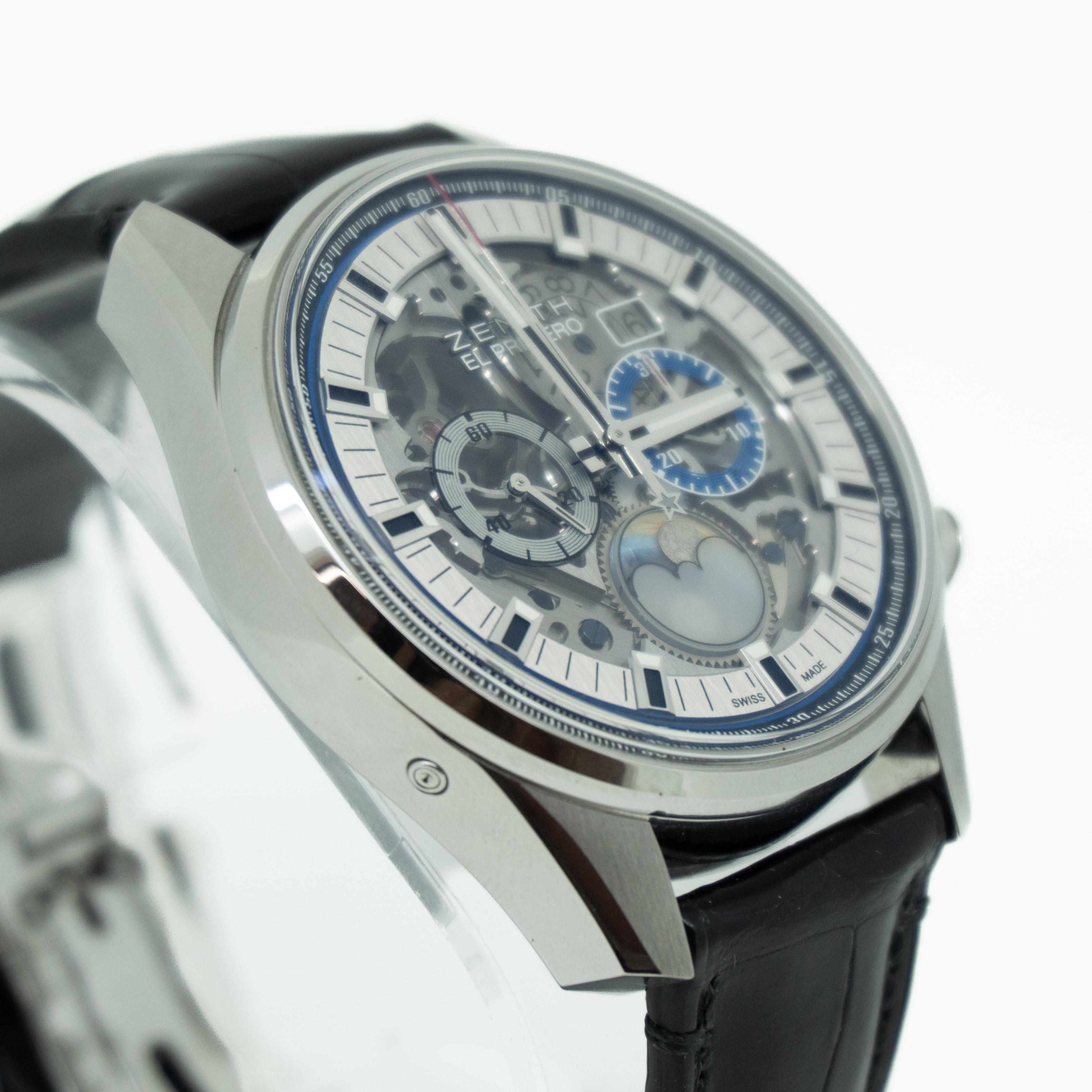Stainless steel case with a black (alligator) leather strap.
Fixed stainless steel bezel.
Silver skeleton dial with luminous silver-tone hands and index hour markers. Minute markers around the outer rim.
Chronograph - two sub-dials displaying: 60