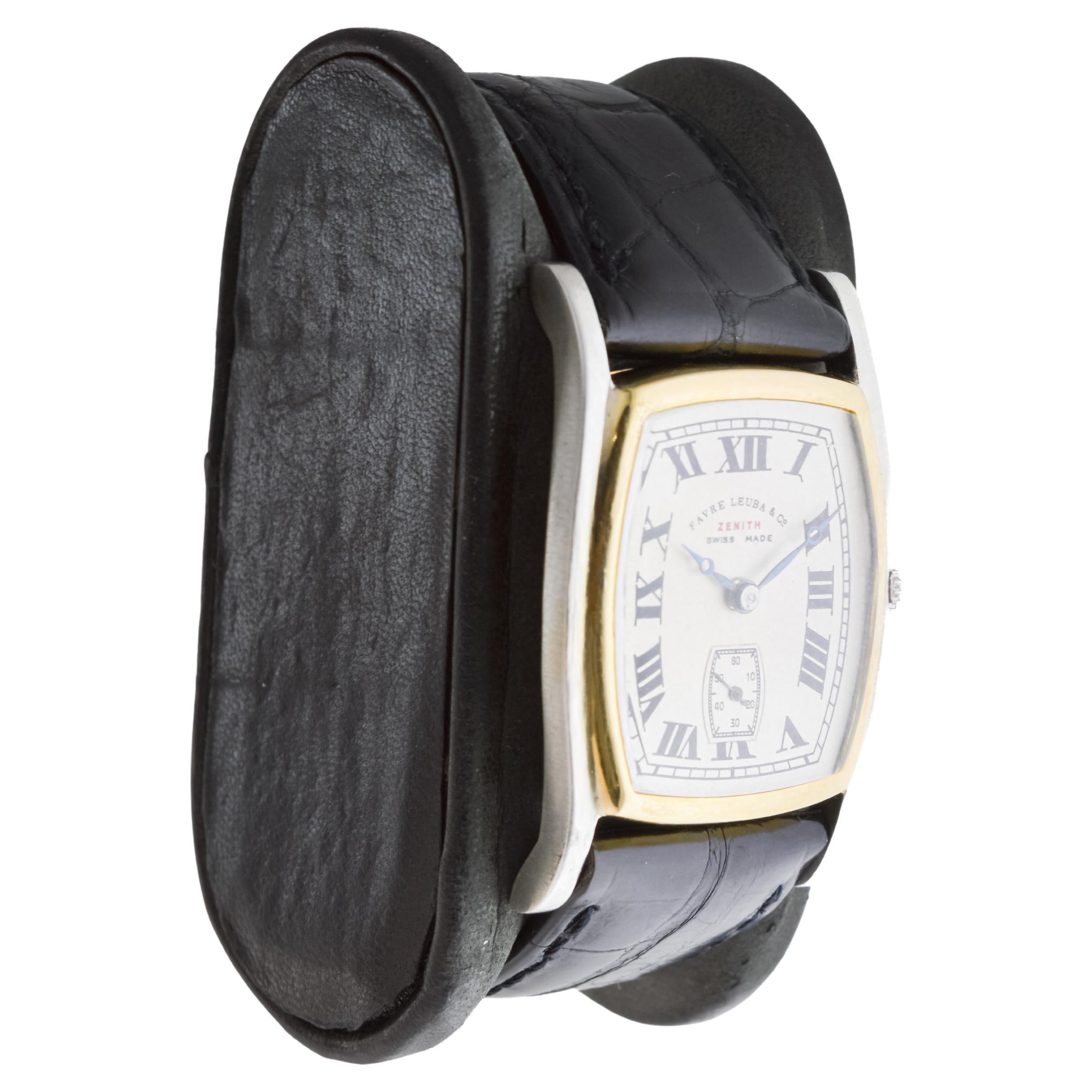FACTORY / HOUSE: Zenith Watch Company
STYLE / REFERENCE: Art Deco / Tortue Shape 
METAL / MATERIAL: Two Tone 18Kt Solid White and Yellow Gold
CIRCA / YEAR: 1930's
DIMENSIONS / SIZE: Length 42mm X Width 28mm
MOVEMENT / CALIBER: Manual Winding / 18