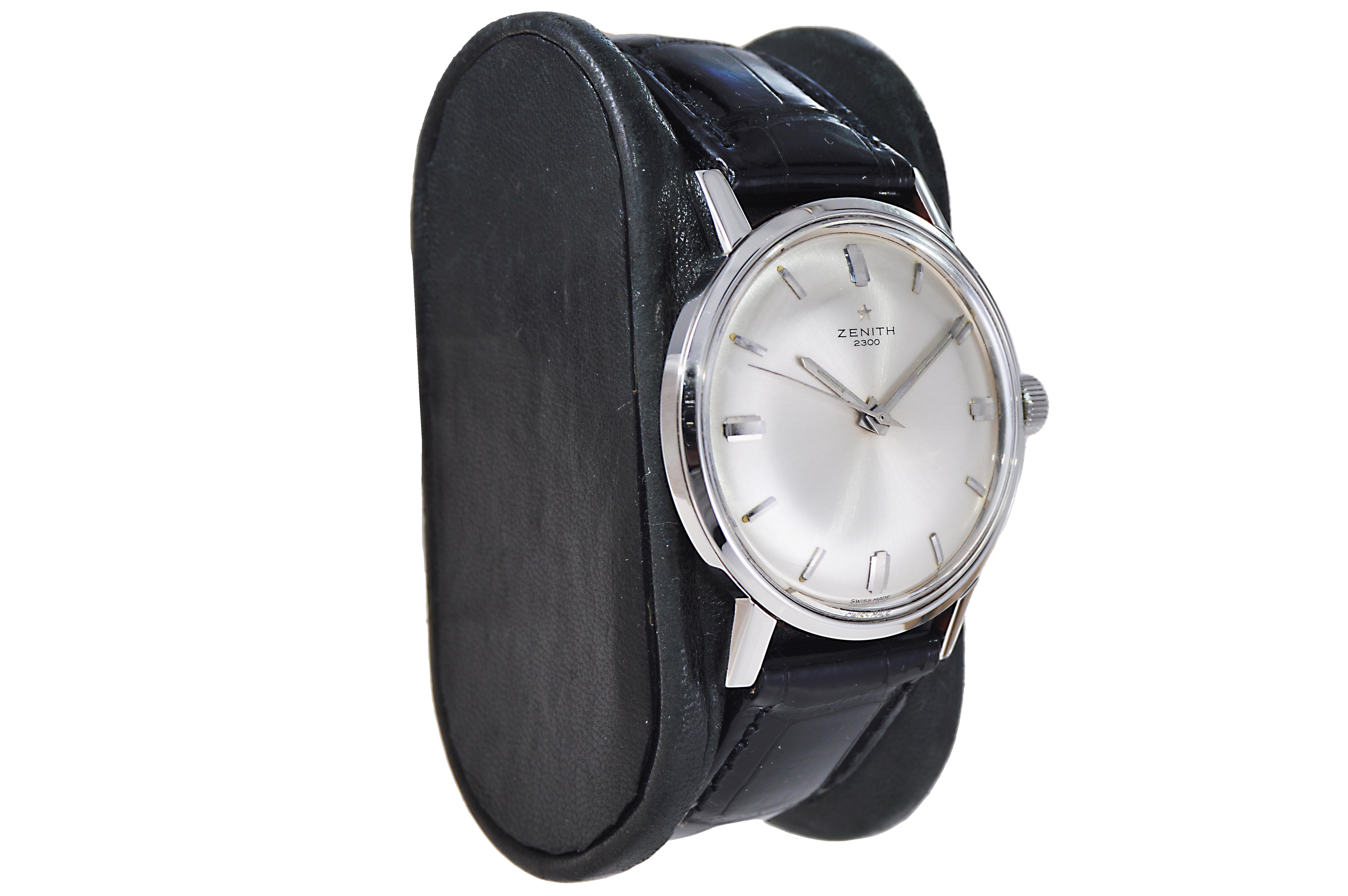 FACTORY / HOUSE: Zenith Watch Company
STYLE / REFERENCE: Mid Century Round
METAL / MATERIAL: Steel 
CIRCA: 1950's
DIMENSIONS: Length 39mm X Diameter 34mm
MOVEMENT / CALIBER: Manual Winding / 17 Jewels 
DIAL / HANDS: Original with Baton Markers /