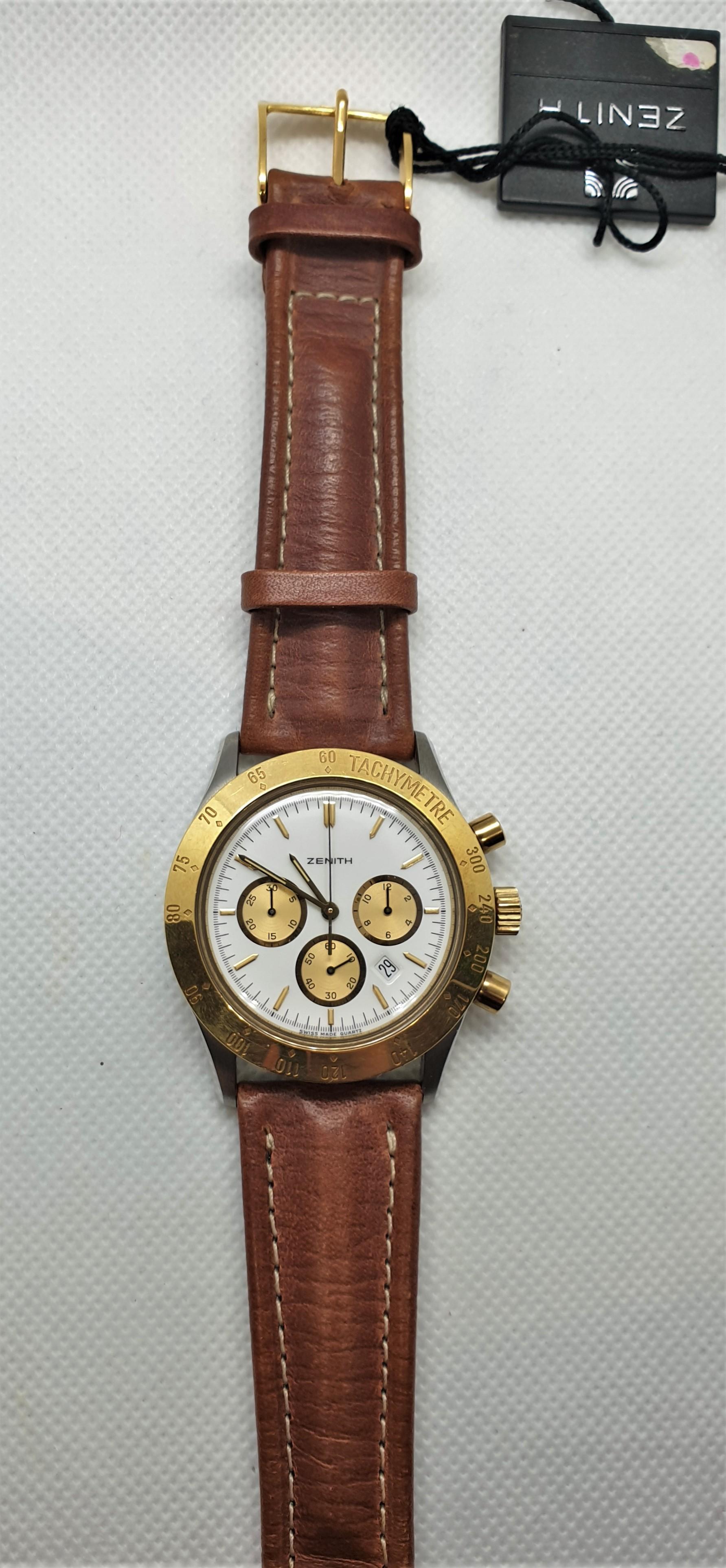 Zenith steel and gold quartz cronograph wrist watch from 1990s, 40 mm diameter, sapphire glass.

Quartz movement, cronograph.

Stainless steel case and 18k Gold bezel. Sapphire glass.

Unworn. 
