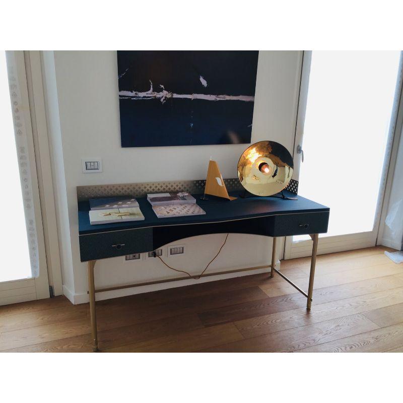 Zénith table light, gold & small by RADAR
Design: Bastien Taillard
Materials: Thermoformed gold glass, built-in light dimmer, magnetic cord. Lacquered metal structure with black matte finish.
Dimensions: Depth 20 x Diameter 40 cm

Also