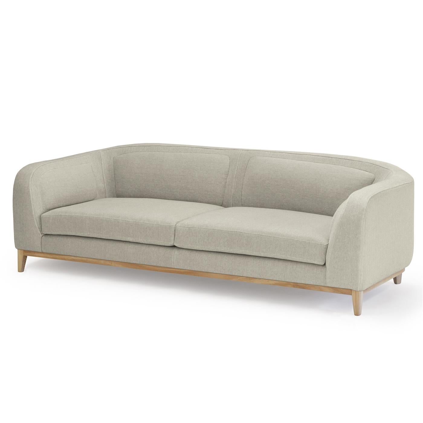 Contemporáneo y compacto, este juguetón Sofá Zeno Beige de Brian Sironi añade estilo a cualquier habitación. Con un diseño clásico de mediados de siglo con un toque moderno, las patas y todo el armazón son de madera de haya maciza, y el asiento y el