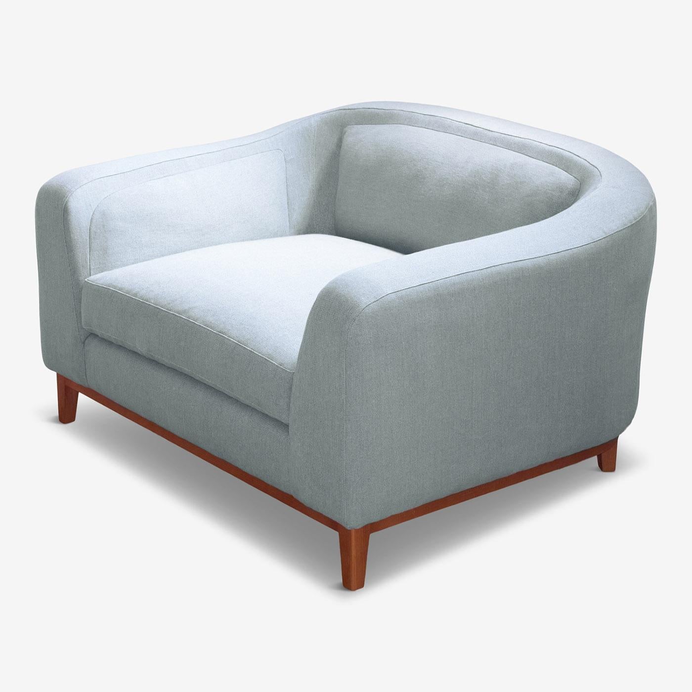 Contemporary and compact, this playful armchair by Brian Sironi adds style to any room. Featuring a mid-century classic design with a modern twist, the legs and entire framework are crafted in solid beech wood and the seat and back have practical