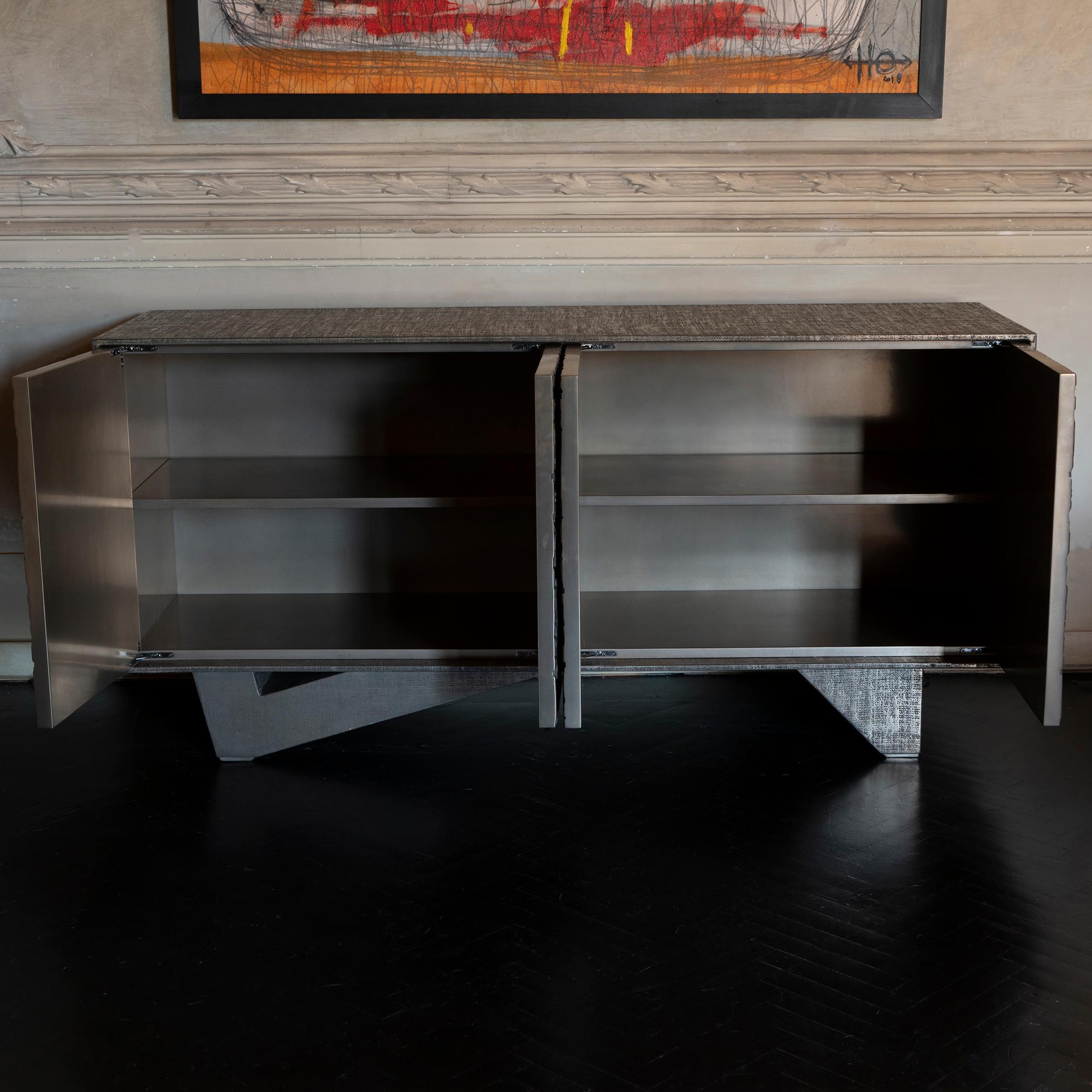 Part of the capsule collection created by Romano Zenoni for Flair, one of a kind sideboard realized with jute and resin all over outside surface with sculptural geometric pattern doors in resin and metal, interior fixed central shelving, Italy 2019.