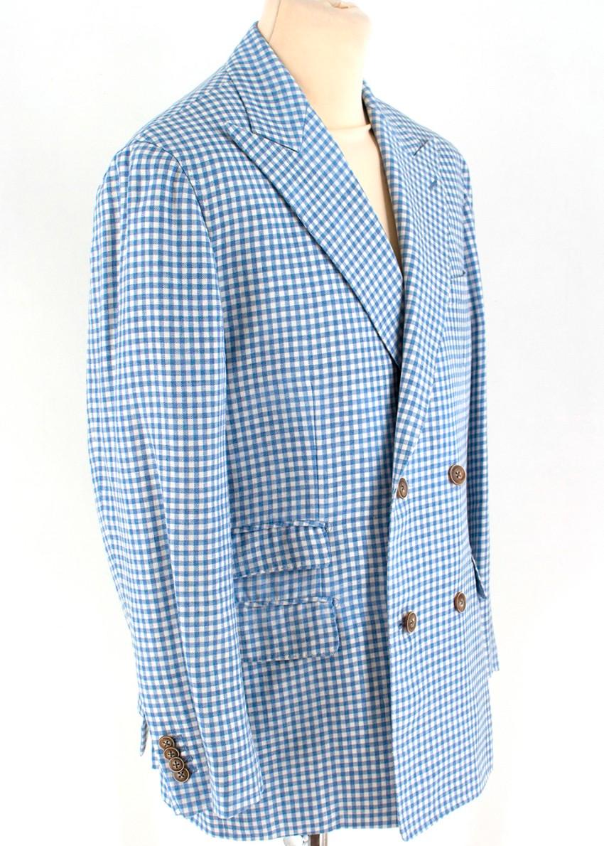 Zerbino Blue & White Gingham Check Blazer

- Blue & white blazer
- Lightweight
- Gingham check print
- Double breasted two buttons fastening
- Peak lapels
- Long sleeved, buttoned cuffs
- Chest welt pocket
- Front flap pockets
- Internal slip