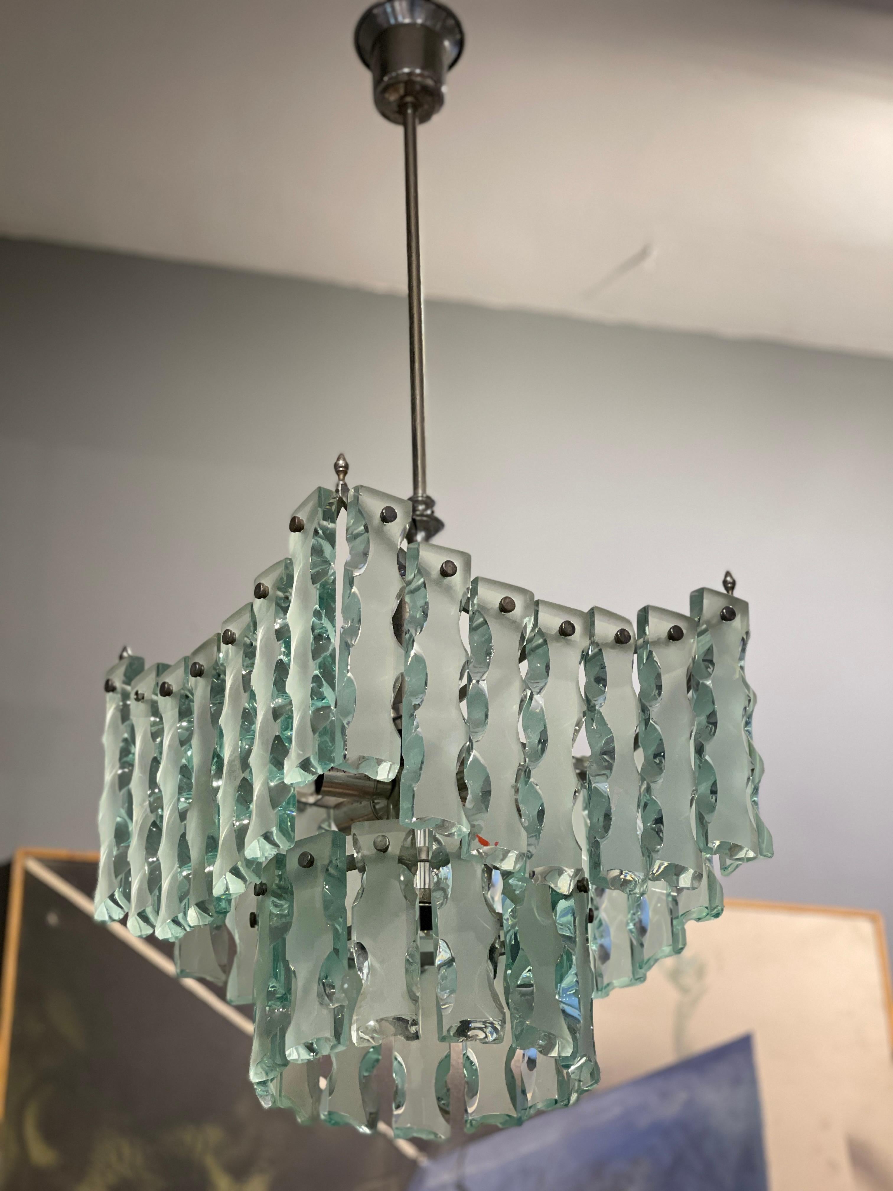 Hammered glass chandelier, Italian production from the 1960s by the Milanese company Zero Quattro.