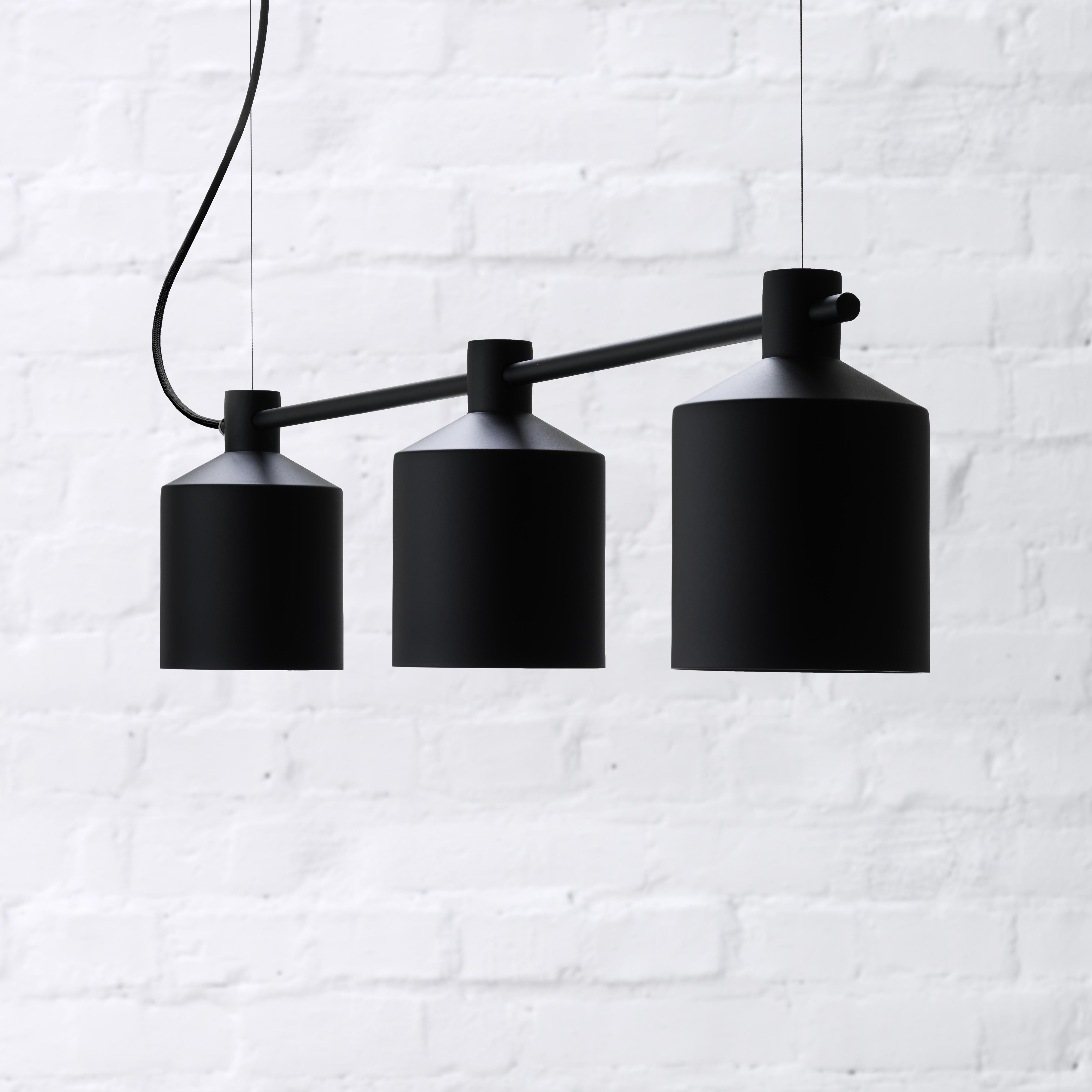 Who knew a grain silo could inspire such a kicky light fixture? That’s exactly what Note Design Studio used for inspiration for Silo Trio pendant, a minimalist fixture that can only be described as industrial chic. 

Environment: Indoor
Shade: