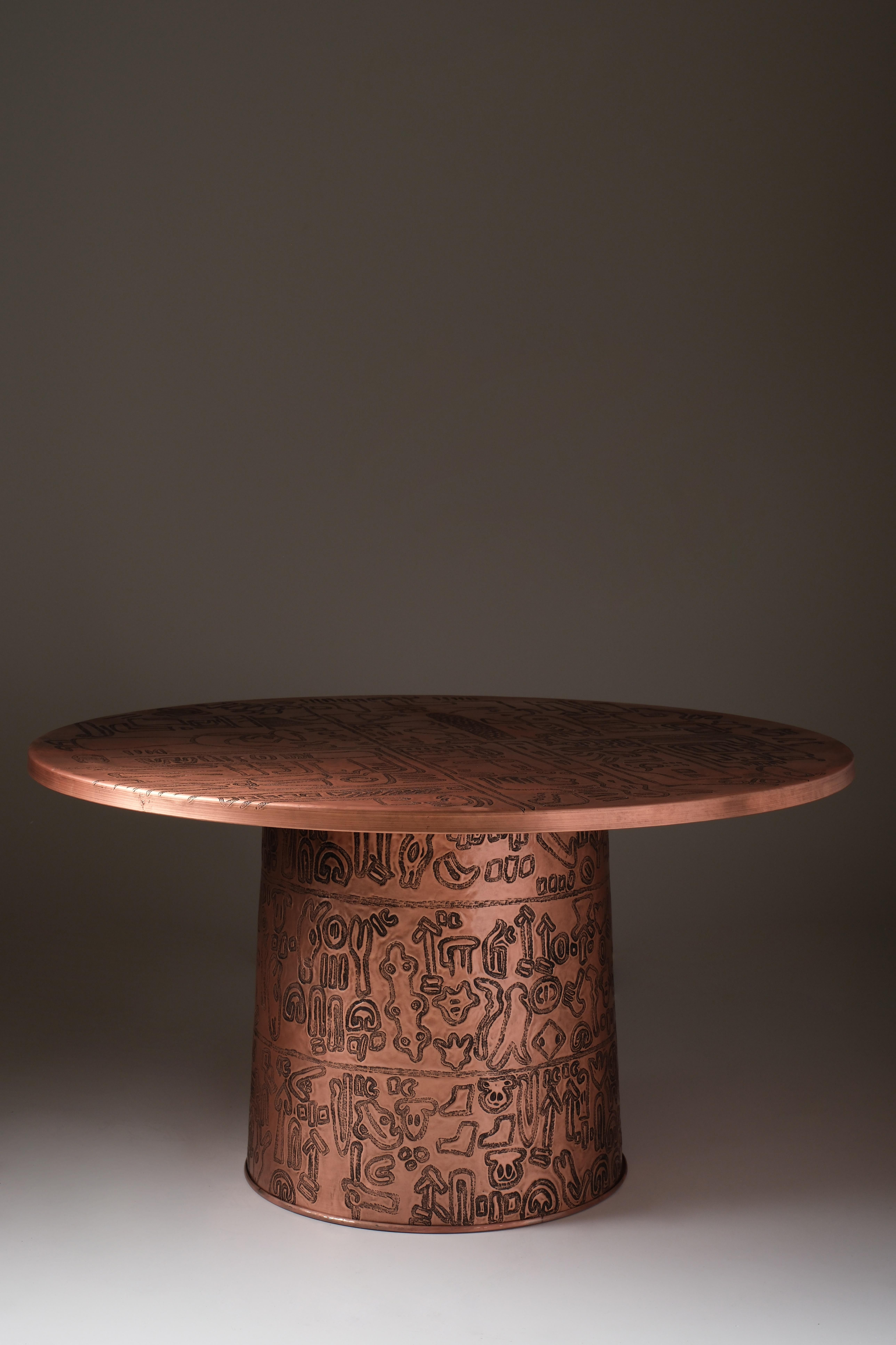 Zero Table by Ayse Zelal Tugrul
One of a Kind
Dimensions: D 85 x H 45 cm.
Materials: Copper.

Table Zero is inspired by the zero point of history, reflecting the ancient beginnings of civilization with ornaments from Göbeklitepe and the Luwian