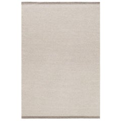 Tappeto Zero Warm Gray in lana intrecciata a mano
