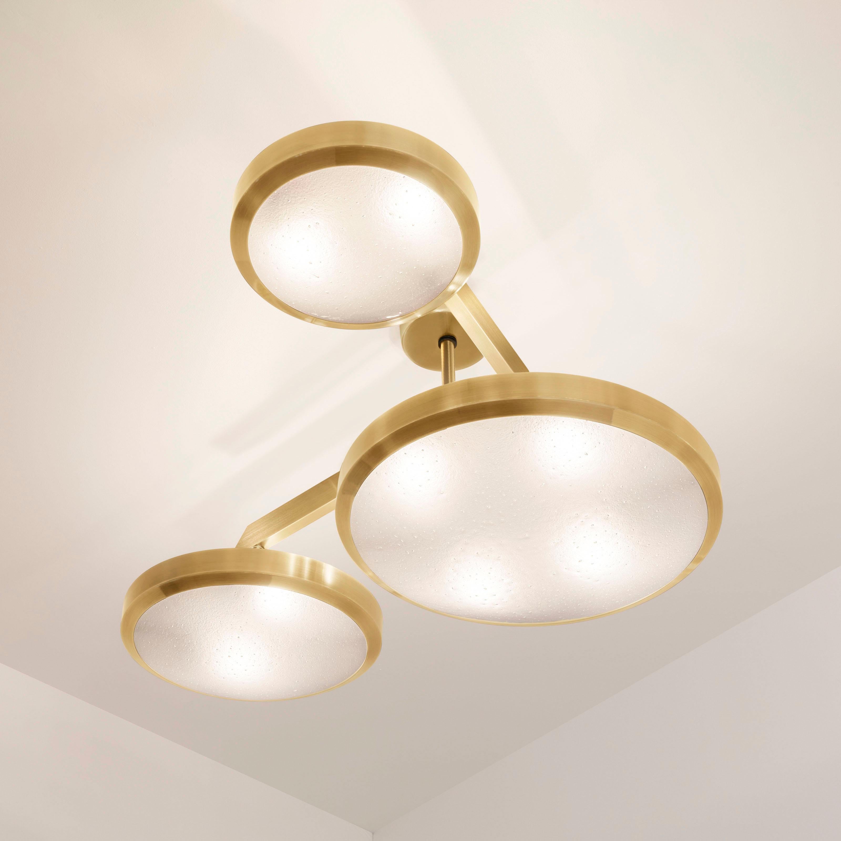 The Zeta ceiling light features a composition of variable sized Murano glass shades methodically balanced on a “V” shaped brass frame. The first images show the fixture in our satin brass finish-subsequent pictures show it in a selection of