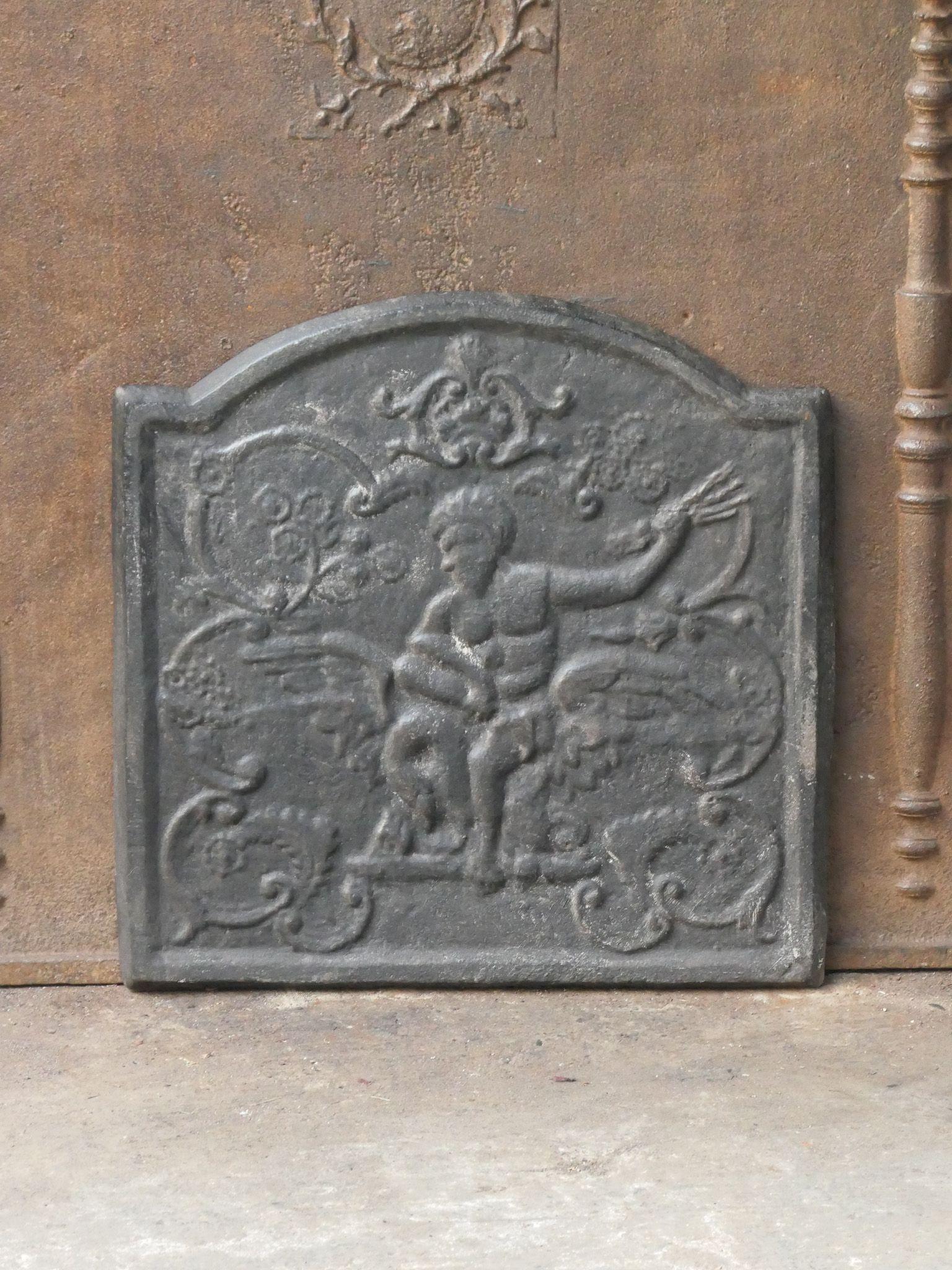 20th century French Napoleon III style fireback. Zeus transformed himself into a swan to seduce the beautiful Leda.

The fireback is made of cast iron and has a black/pewter color. The fireback is in good condition and does not have cracks.