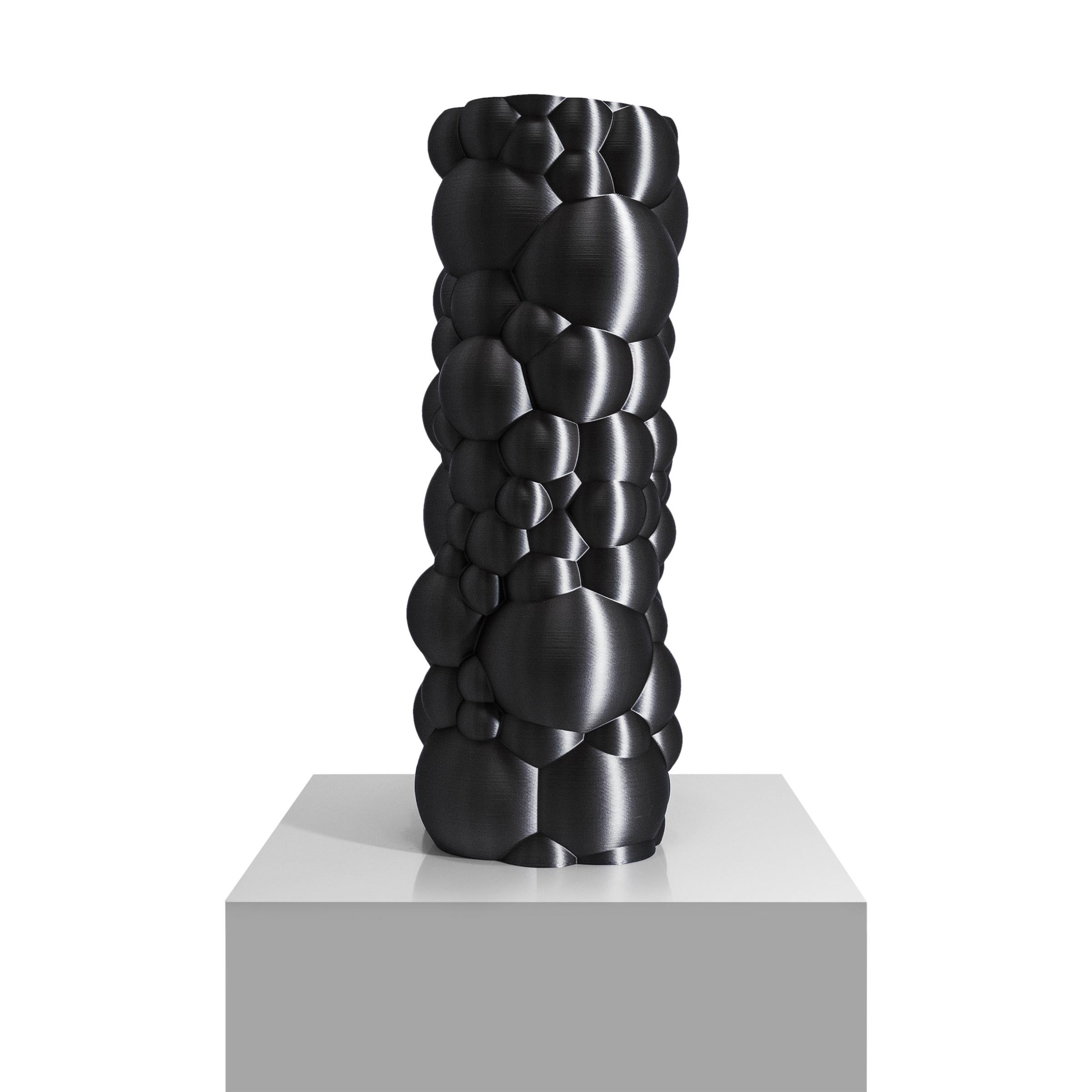 Vase-sculpture by DygoDesign

Best paired with the white variant of the same resin sculpture for an exquisite contrasting look, this gorgeous sculpture is a one-of-a-kind object d'art to decorate a contemporary interior with lively allure. It