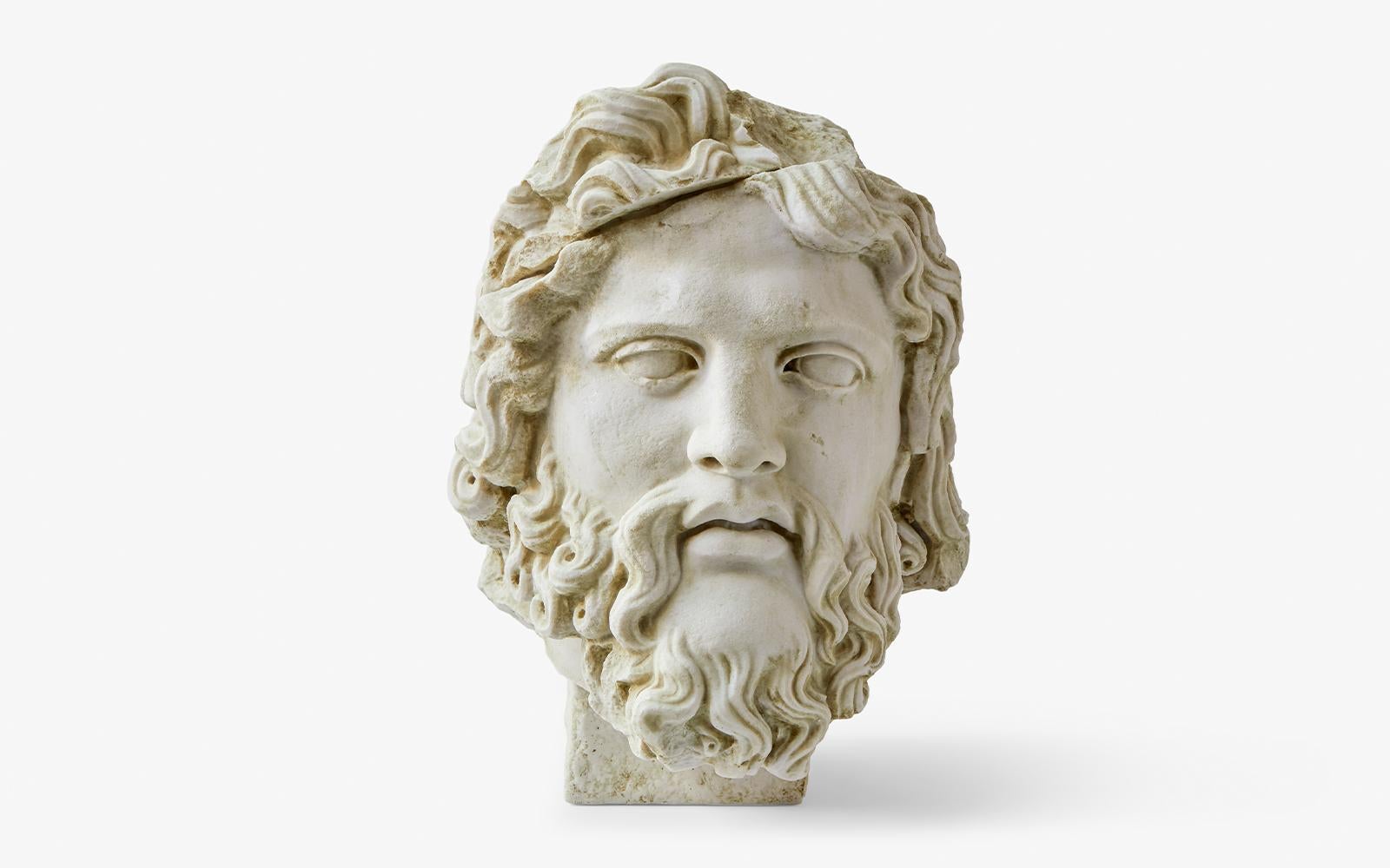 Zeus bust sculpture by Lagu.
Designed by Ufuk Ceylan.
Dimensions: W 30 x D 40 x H 43 cm.
Materials: statuary marble, cast.

Zeus is known as the father of the gods and humans in Greek mythology. He is associated with strength, bravery and