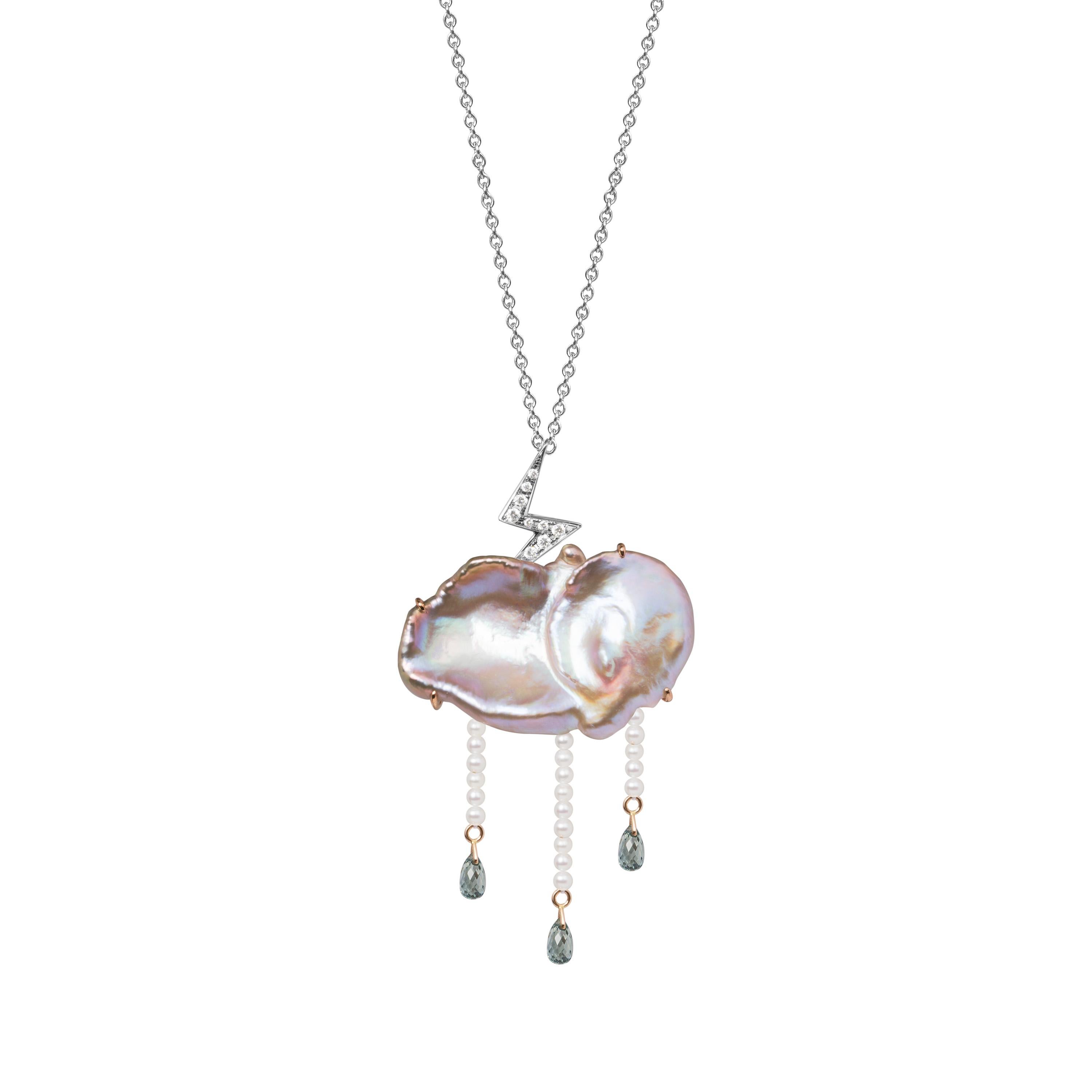 A 18K white gold convertible brooch-pendant with a diamonds-set lightning (0,12cts), keshi, white pearls and sapphire briolettes 2,08 ct . Inspired by the scepter of Greek king of gods, this thunder lightning sparkles and illuminates a pearly cloud