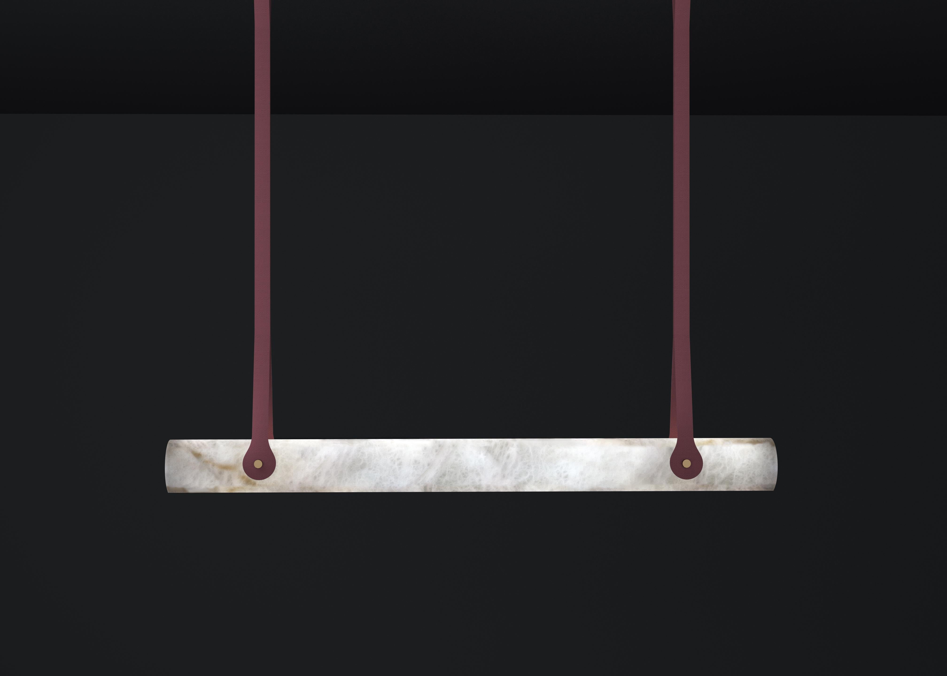 Zeus Pomegranate Red Leather Pendant Lamp by Alabastro Italiano
Dimensions: D 11 x W 120 x H 100 cm.
Materials: White alabaster and leather.

Available in different finishes: Black leather, Brown Earth leather, Brown Sahara leather and Pomegranate