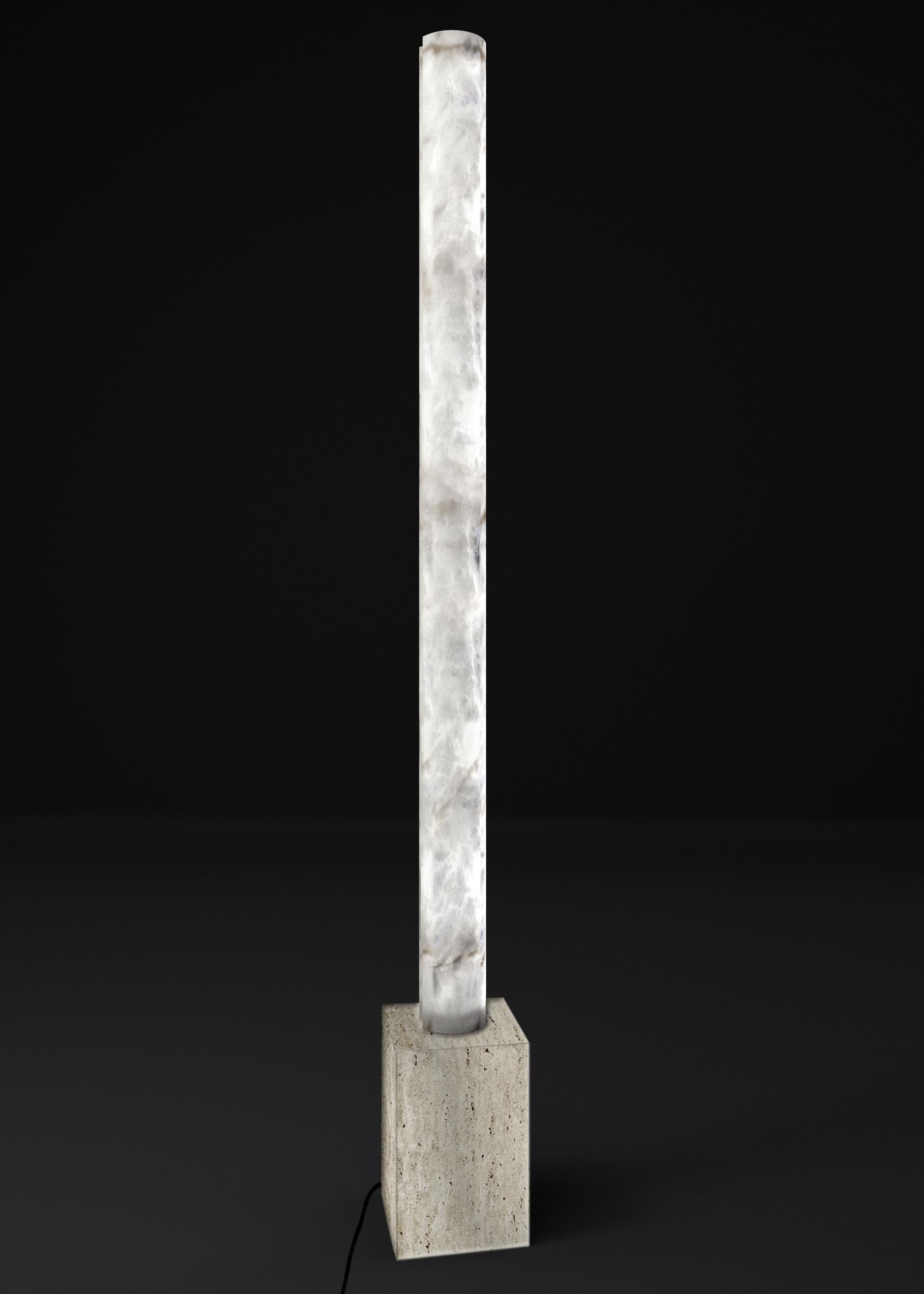 Zeus Travertino Floor Lamp by Alabastro Italiano
Dimensions: D 25 x W 25 x H 185 cm.
Materials: White alabaster and travertine.

Available in different finishes: Black Marquinia marble, Emperador marble, Travertino stone and Verde Alpi marble.