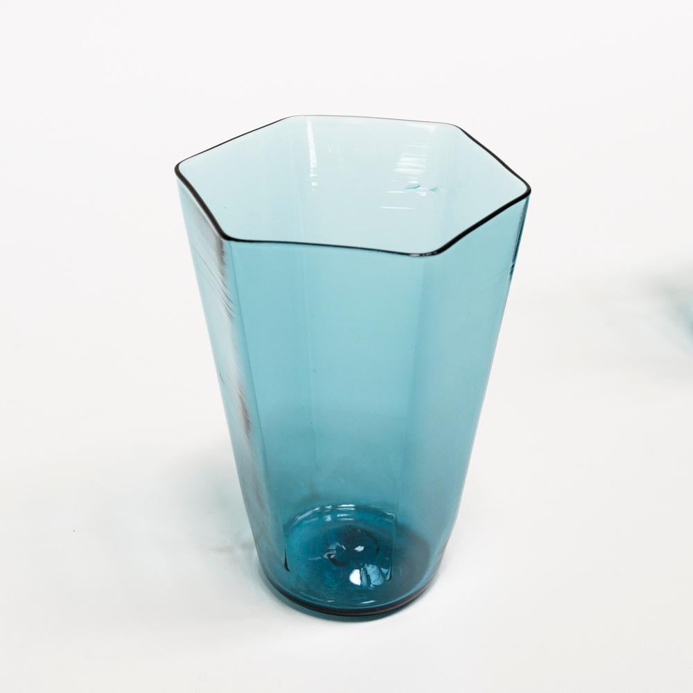 Handmade glass for JG Switzer by Asher Holman for Zev Glass, an accomplished glass artisan based in North Carolina who studied in Kentucky, these extraordinary glass drink glasses are signed by the artist. It feels like water, wine or any drink