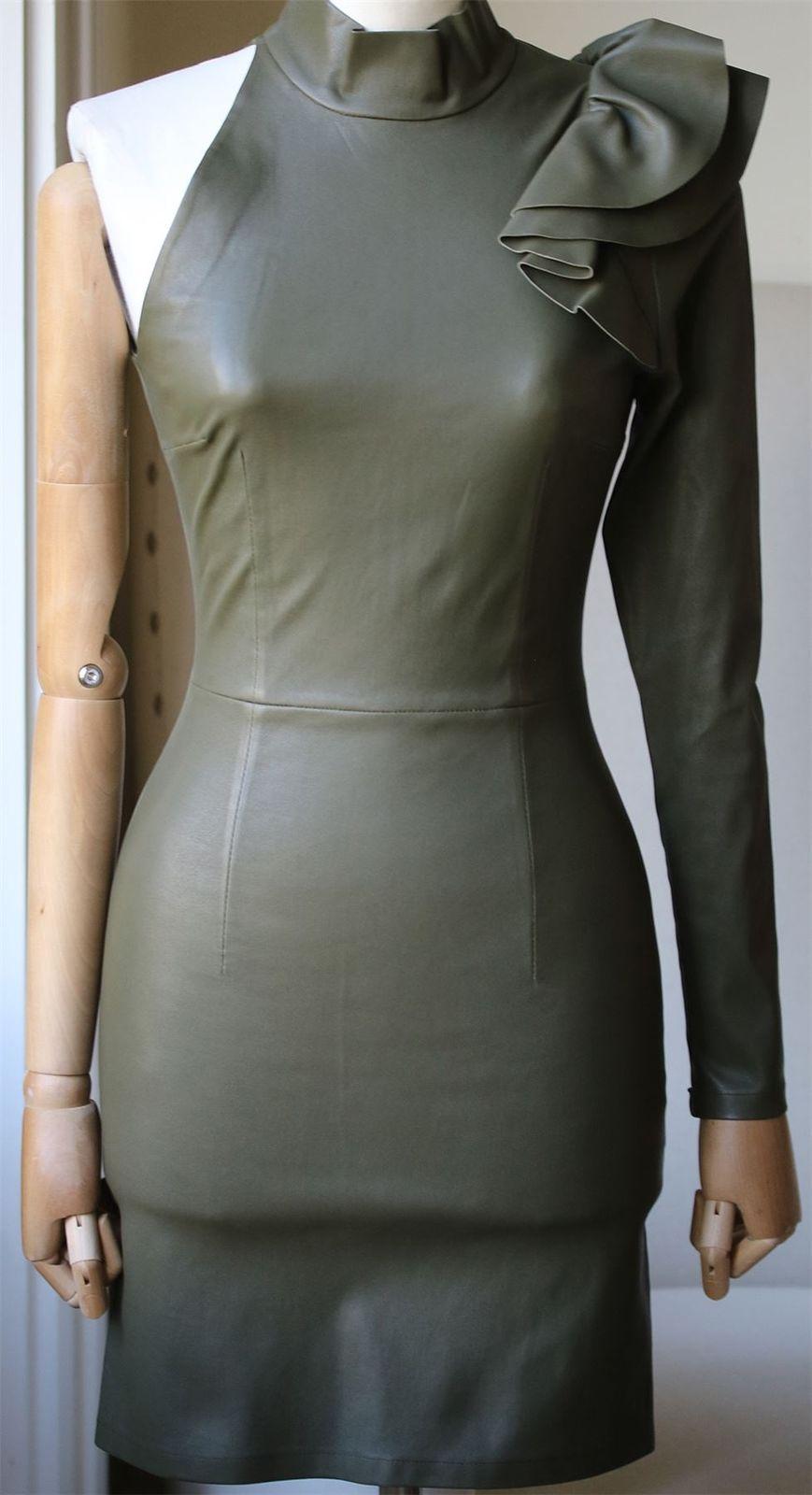Zeynep Arçay leather dress's skintight material will make you look amazing, while the details — one long sleeve, turtleneck, and shoulder ruffles - will add a high-fashion edge to your look... 100% stretch lamb skin. Color: Olive Green.

Size: FR 36