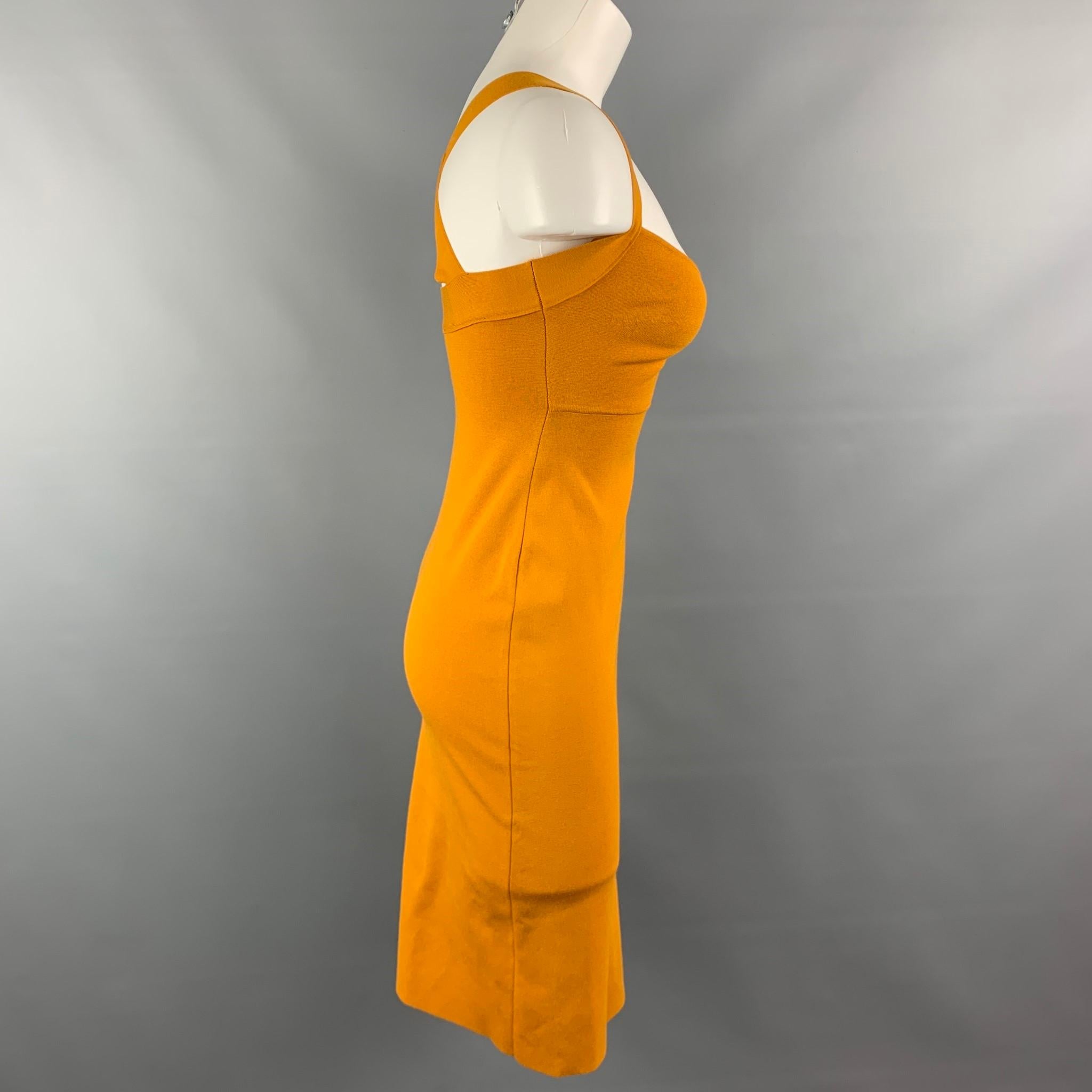 ZEYNEP ARCAY cocktail dress comes in a mustard stretch viscose featuring a criss-cross back strap, stretch fit, and a side slit.

Good Pre-Owned Condition.
Marked: FR 36 / IT 40 / US 4 / UK 8

Measurements:

Bust: 24 in.
Waist: 26 in. 
Hip: 30
