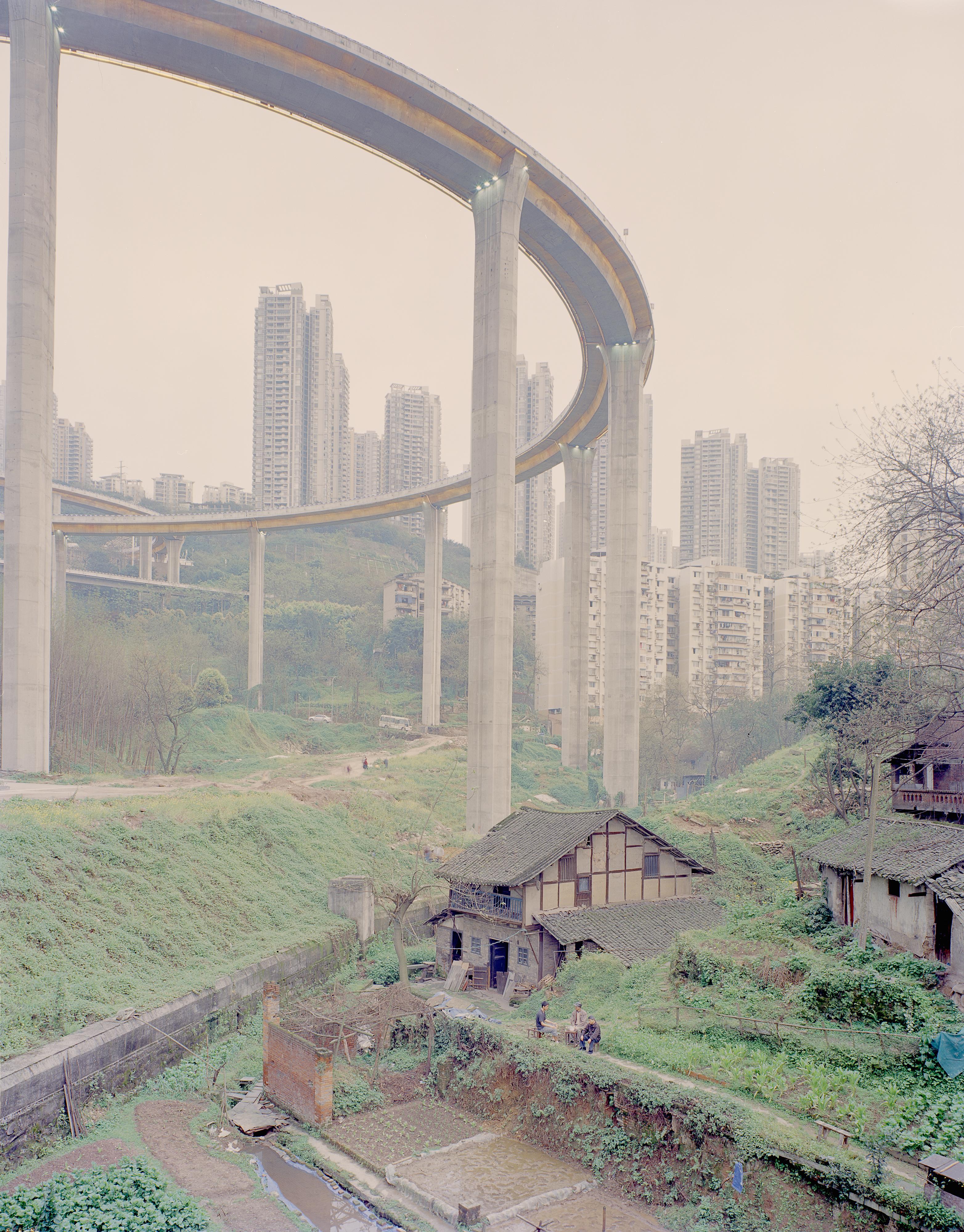 house under a bridge