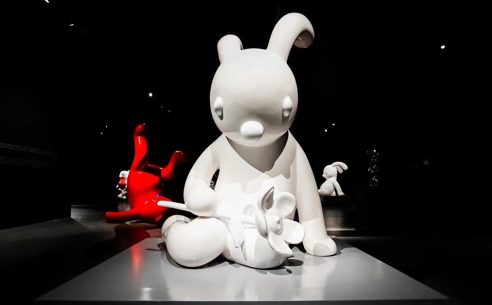 A Little Shy White Color Rabbit with Flower Fiberglass Out Door Life Size - Sculpture by Zhang Zhanzhan
