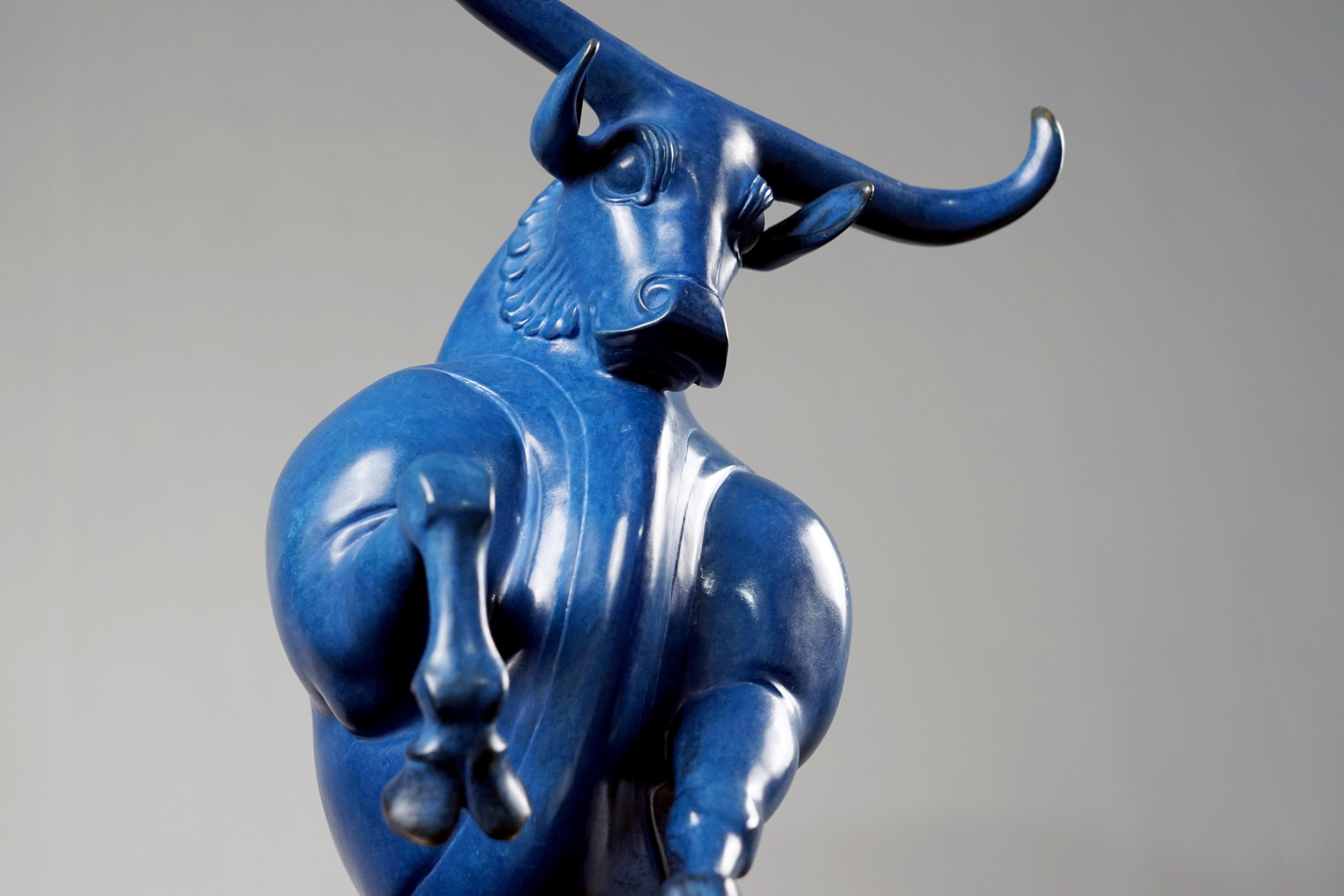 This bull is blue, it looks calm and deep.
 I deliberately exaggerated the sense of power of this bull. Its limbs stretch to the limit, showing a state of preparations to rush forward. 