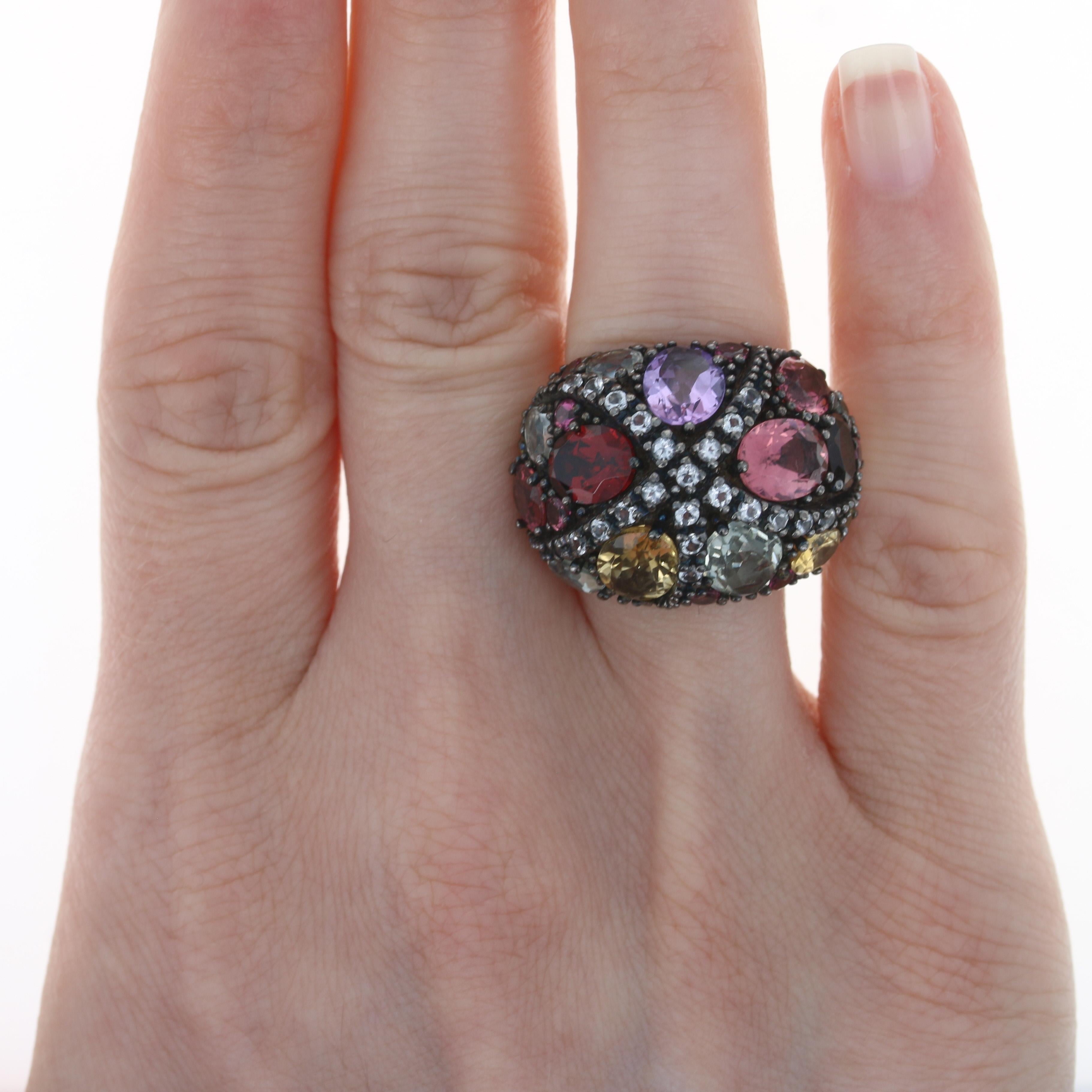 Retail Price: $1,847.50

Size: 6 1/2

Brand: Ziba by Le Vian

Metal Content: Sterling Silver

Stone Information
Genuine Tourmalines
Cuts: Oval & Round 
Color: Pink

Genuine Citrines
Treatment: Heating 
Cuts: Oval & Round 
Color: Yellow

Genuine
