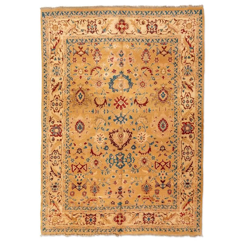 Ziegler Turkish Rug Design of centerless palmette flowers on a gold background in the central field.
- The rest of the decorative elements follow linked patterns of figures.
- Highlight the use of yellow, blue and red throughout its design.
- Great
