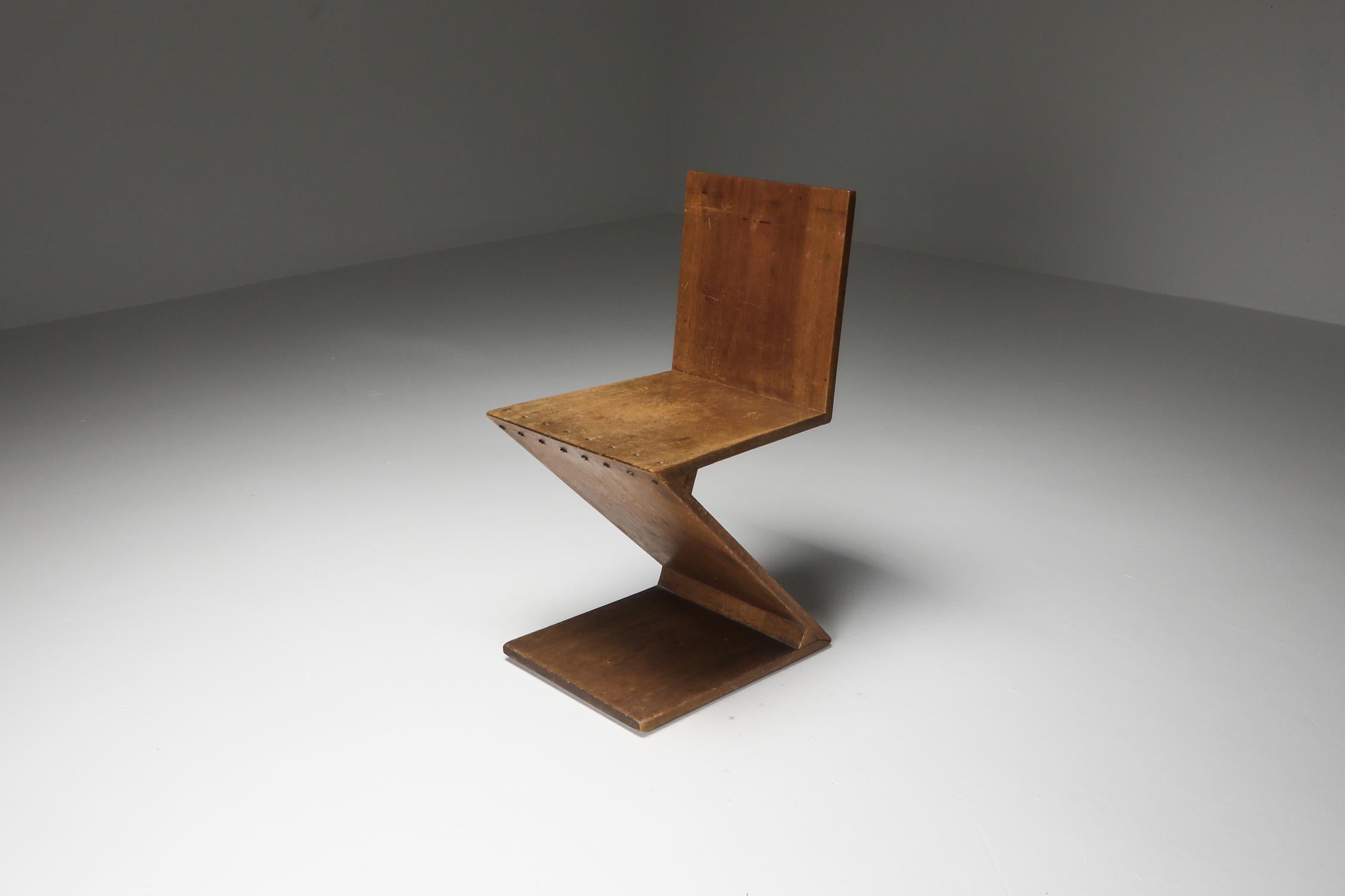 Zig-Zag chair, design 1932, executed c. 1939-1947, Produced by G. van de Groenekan or Metz & Co, NL
Solid Mahogany Wood

This chair is one of the earliest fully documented zig zag chairs by Rietveld, 
full provenance and expertise