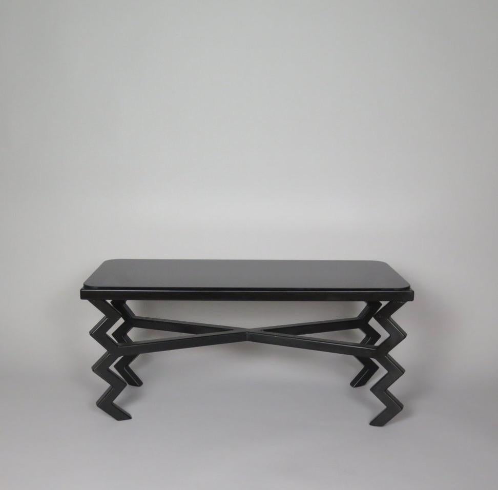 Contemporary hand-forged 'Zig-Zag' coffee table by Matthew Sidow.

Hand-Painted Satin Black Steel Base with Black Glass Top. Each piece is handmade by our skilled artisans in the United States.

Please inquire for customization requests.