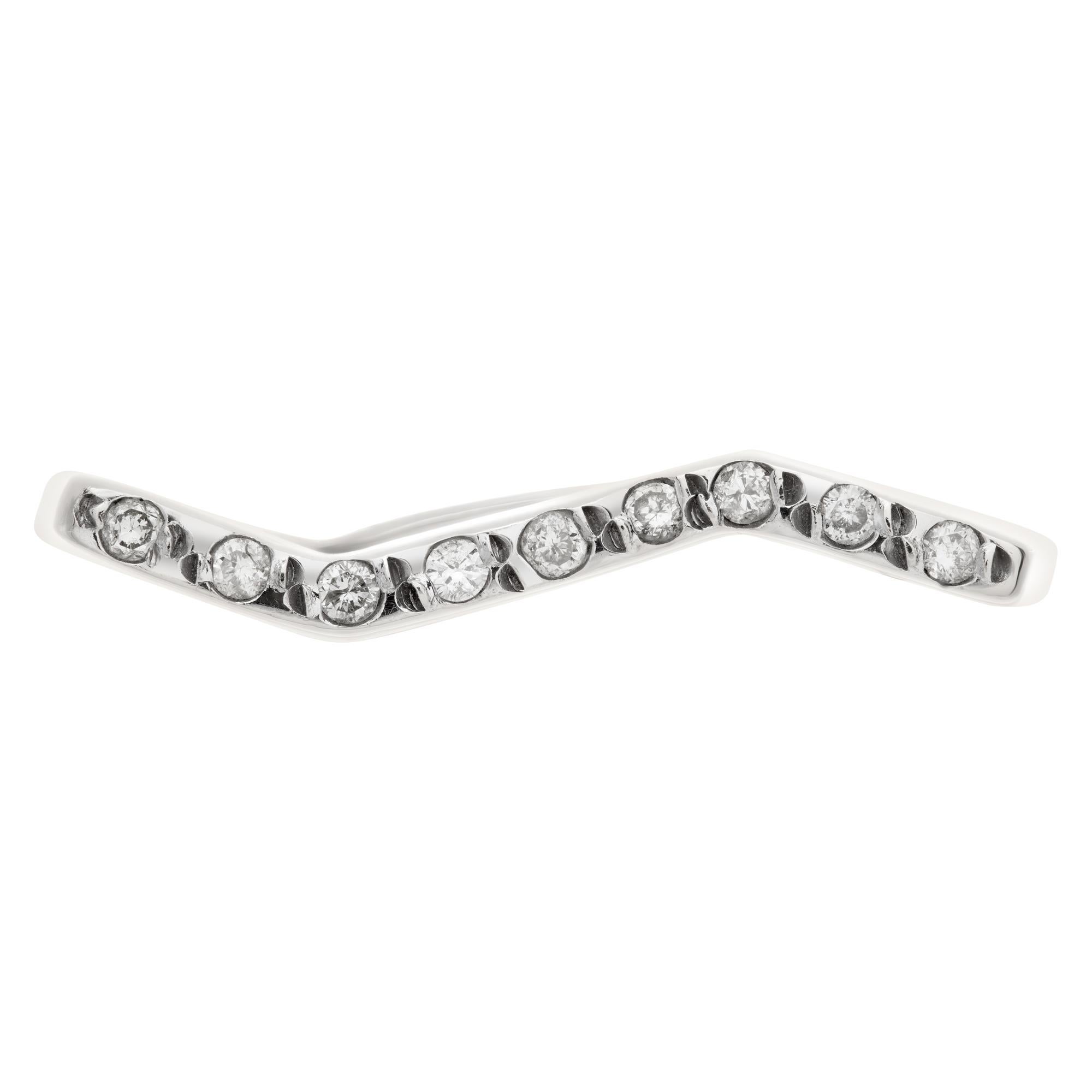 Zig-zag diamond line ring in 18k white gold, app. 0.10 carats in round diamonds. Size 8.This Diamond ring is currently size 8 and some items can be sized up or down, please ask! It weighs 2.6 pennyweights and is 18k.