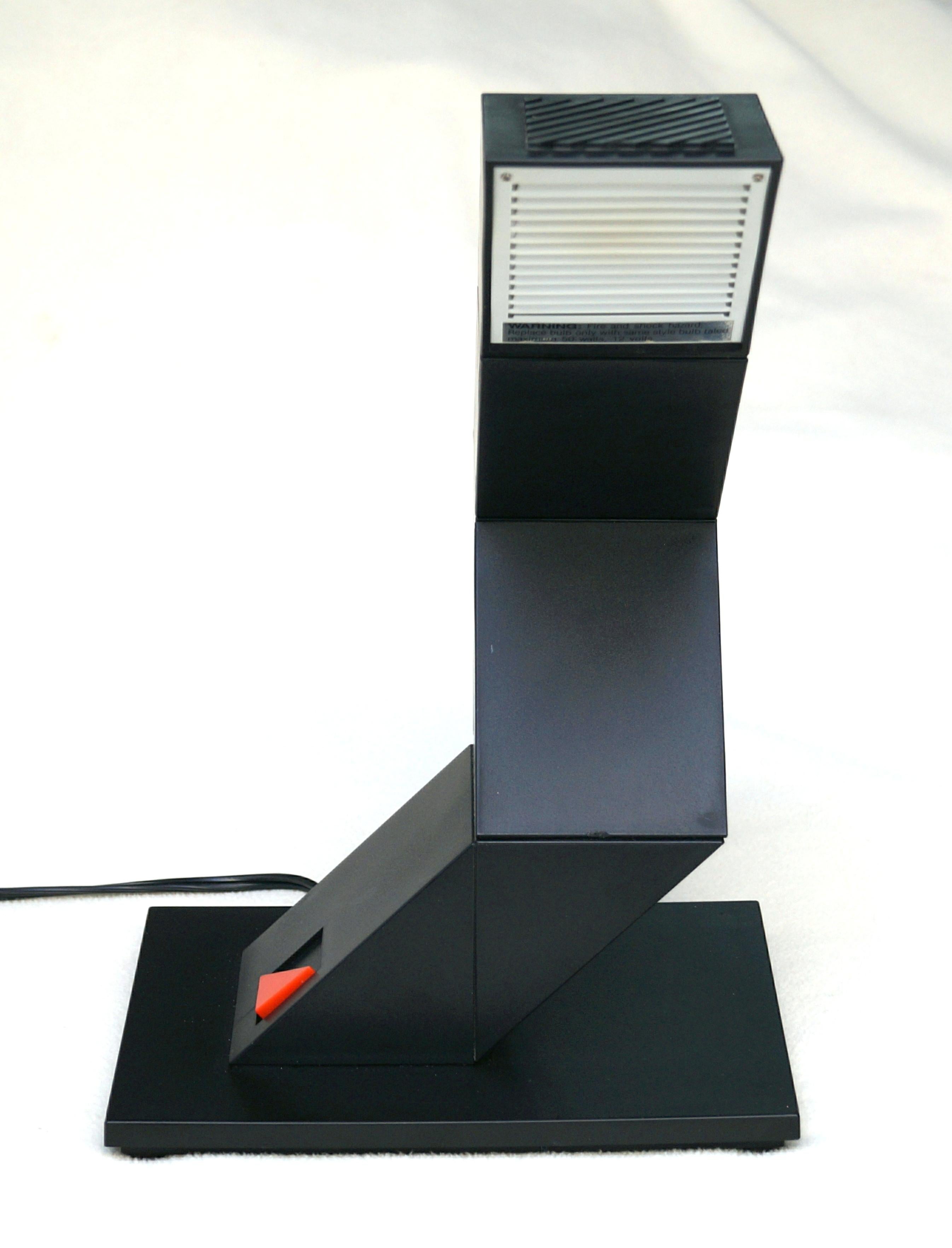 A beautiful Halogen Mid-Century Modern 1980's Zig Zag Table Lamp . Great as a Table or Desk lamp.  You can create many shapes by moving pieces various directions, much like a rubics cube.  Size will vary, depending on the position you have it in.