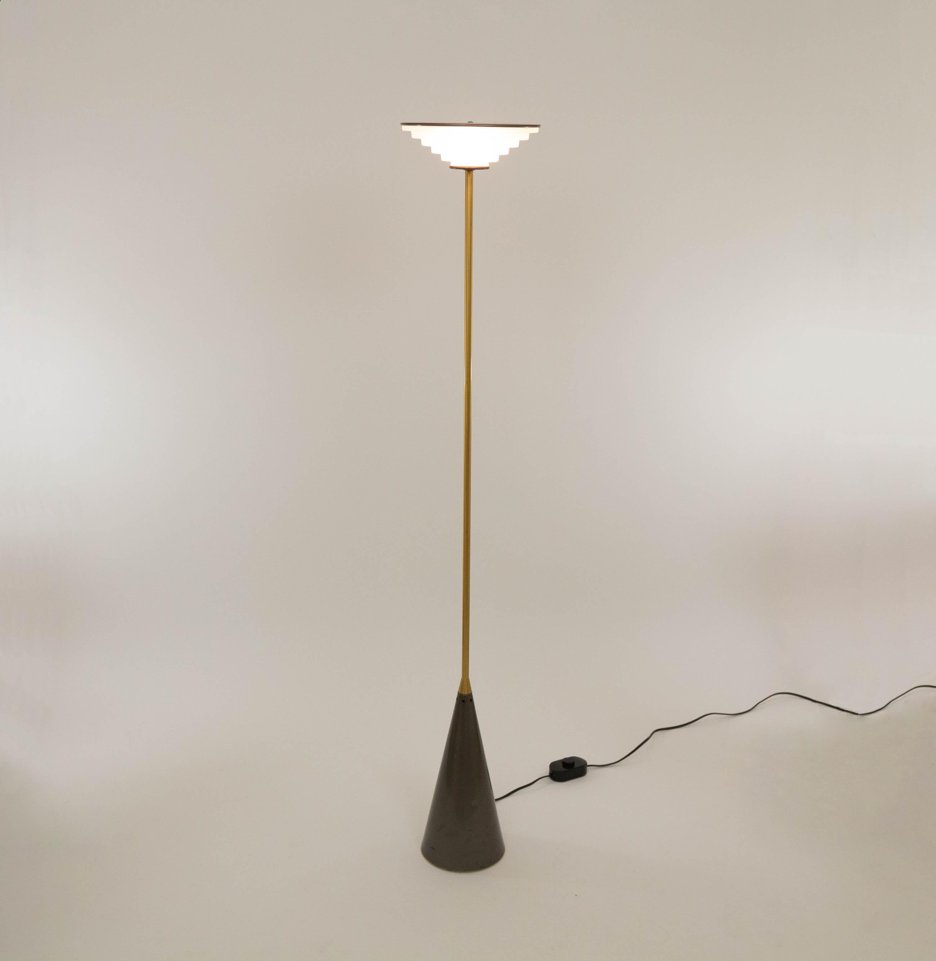 Ziggurat is a halogen floor lamp designed by Shigeaki Asahara in 1981, and manufactured by Italian lighting manufacturer Stilnovo.

The lamp consists of a conical metal base and an inverted ziggurat-shaped moulded glass diffuser with a metal top.