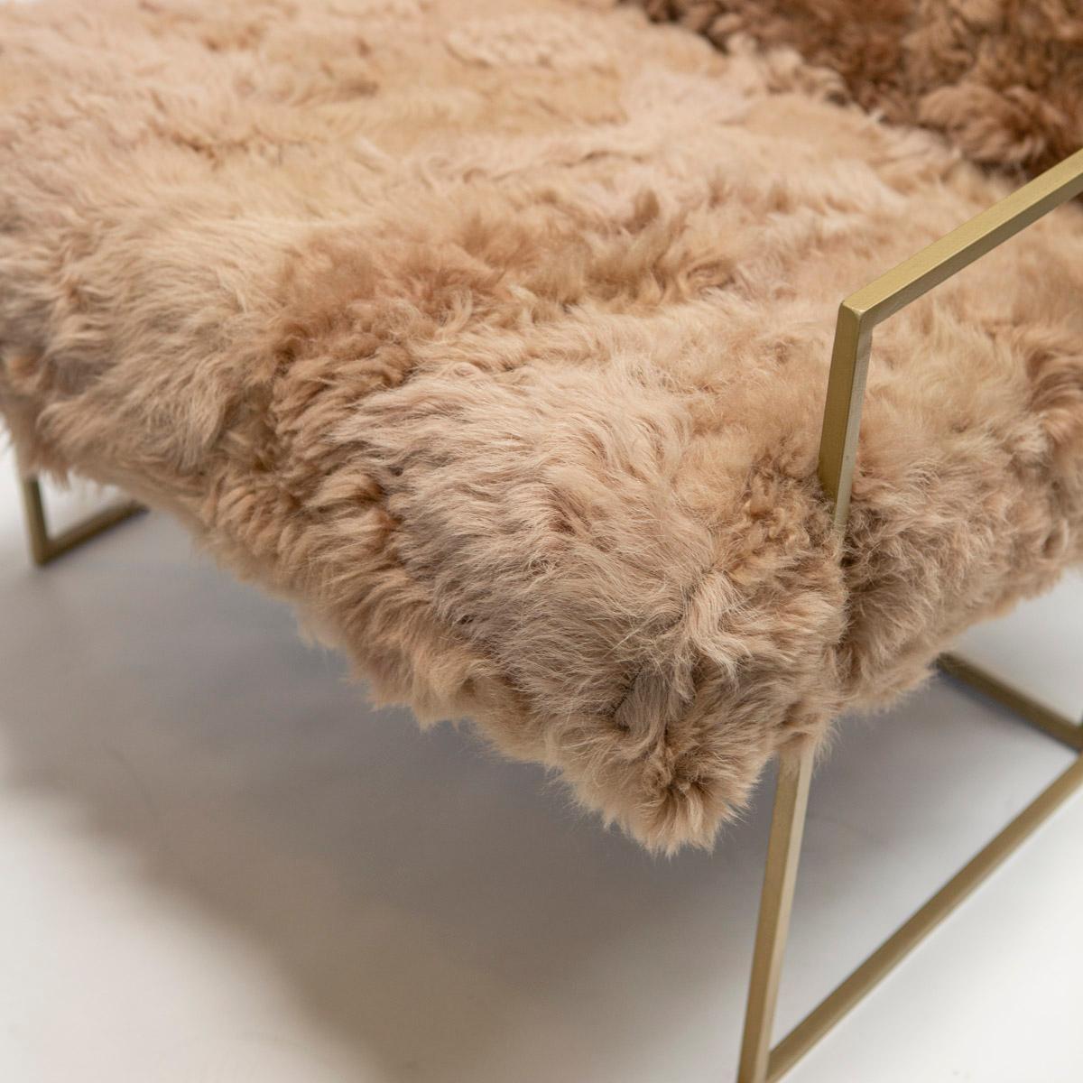 The Ziggy chair is a solid metal steel frame offered in black matte or brass colors and is the perfect showcase for JG SWITZER's custom made Upcycled, real sheep fur. 

Please allow for natural hide differences, each chair will be slightly unique,