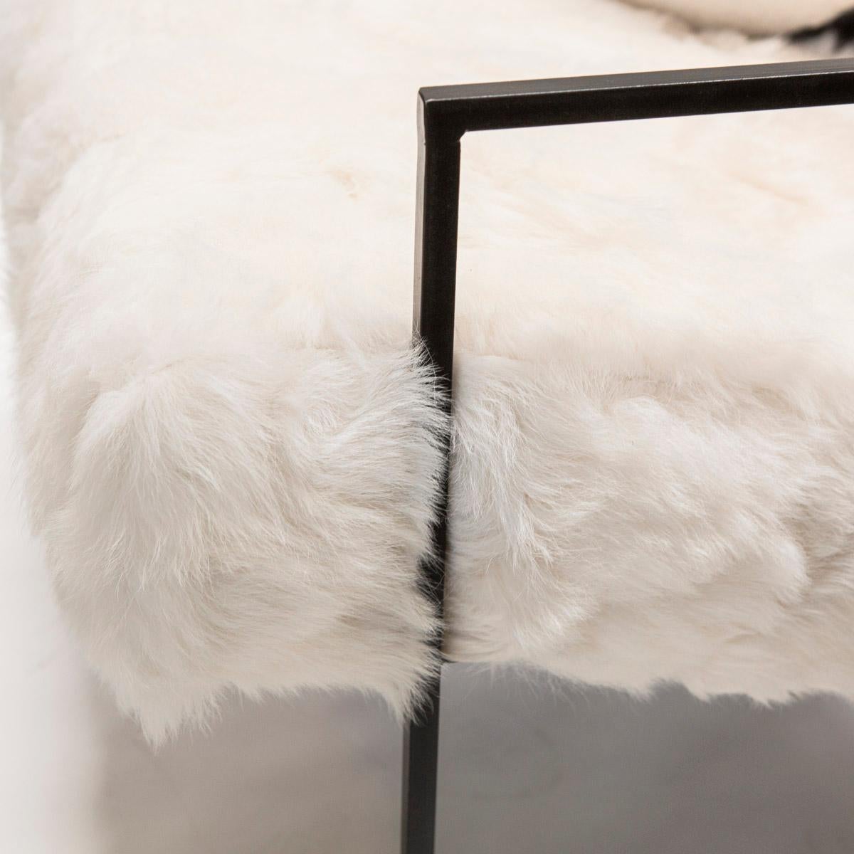 The Ziggy chair is a solid metal steel frame offered in black matte or brass colors and is the perfect showcase for JG SWITZER's custom made Upcycled, real sheep fur. 

Please allow for natural hide differences, each chair will be slightly unique,