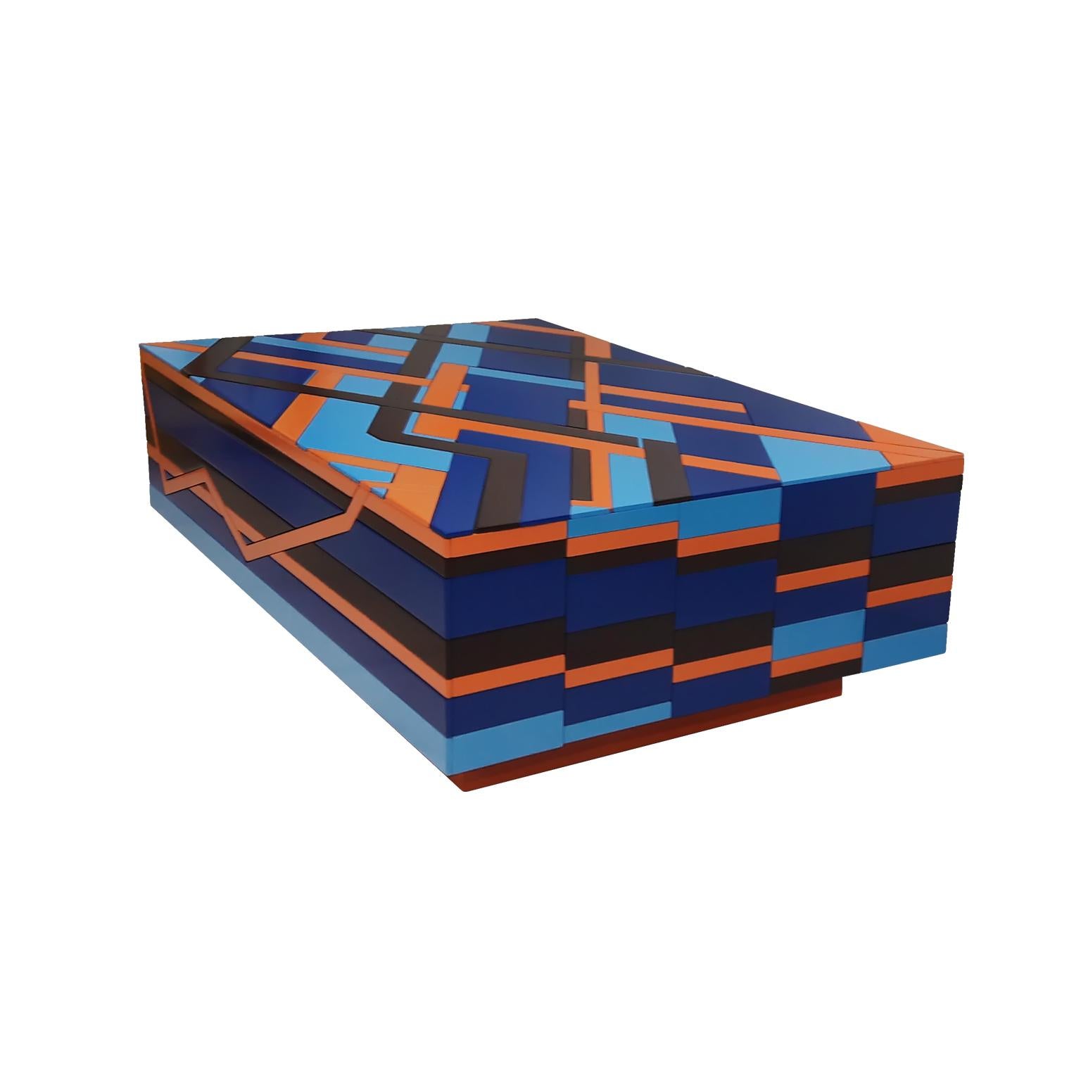 The Ziggy coffee table created by the designer Leo Di Caprio was conceived after a study of the jewels of Brazilian indigenous people, that has been working with natural seed to create geometric shape designs and combinations of colors on bracelets,