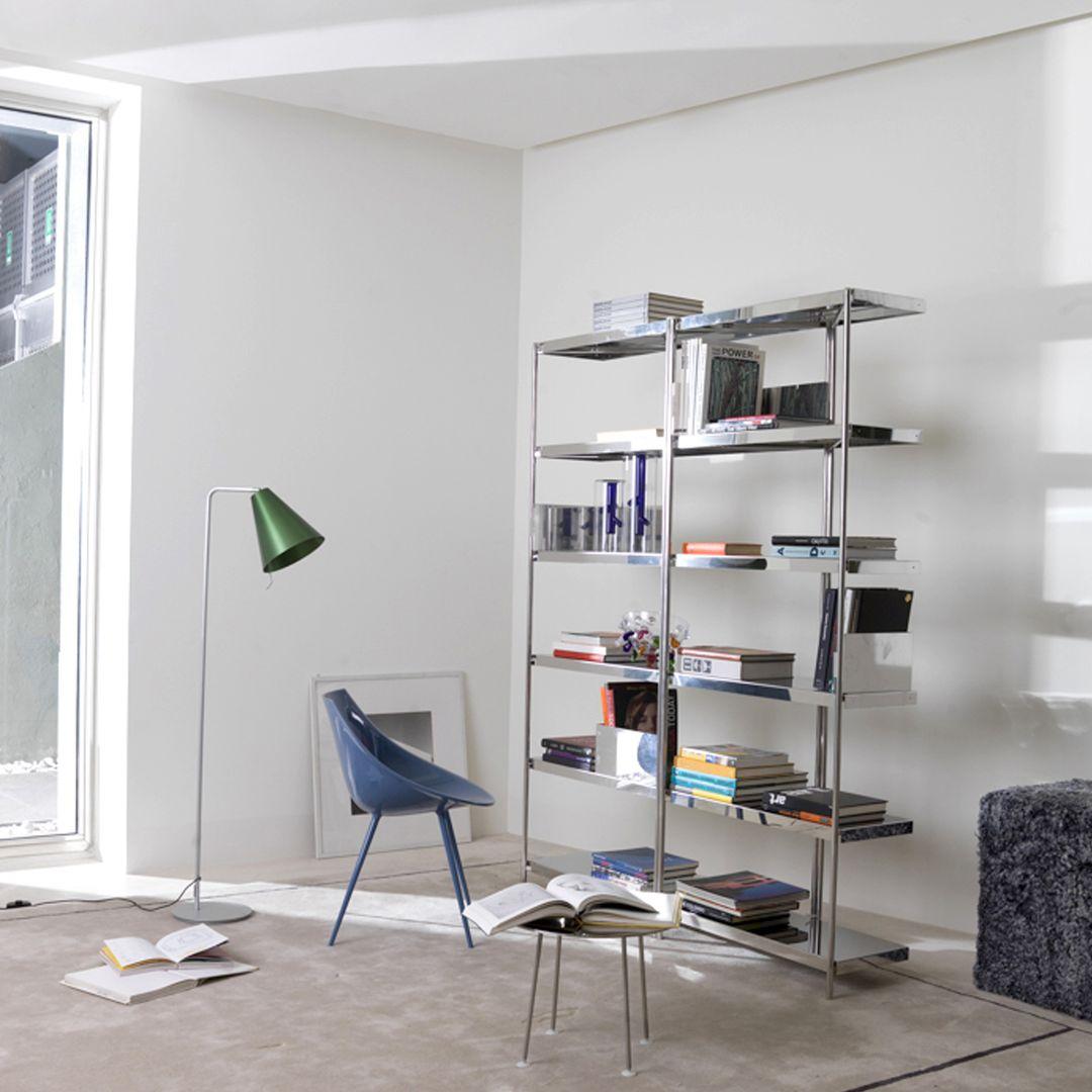 The shelf’s Zigzag shaped structure is simple and fresh; the color palette for the metal work - black, white, bronze and polished stainless steel - is complemented by two kinds of wooden shelves, oak and American walnut. The clip-on bookends are