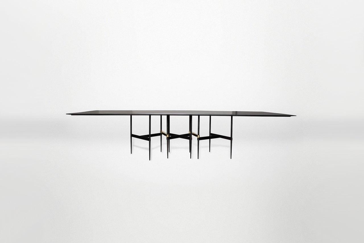 The Montauk Dining table in marble/wood tabletop with marble base and brass details.

Dimensions: 
Medium
L 280.0cm/110.2”
W 110.0cm/43.3”
H 73.6cm/28.9