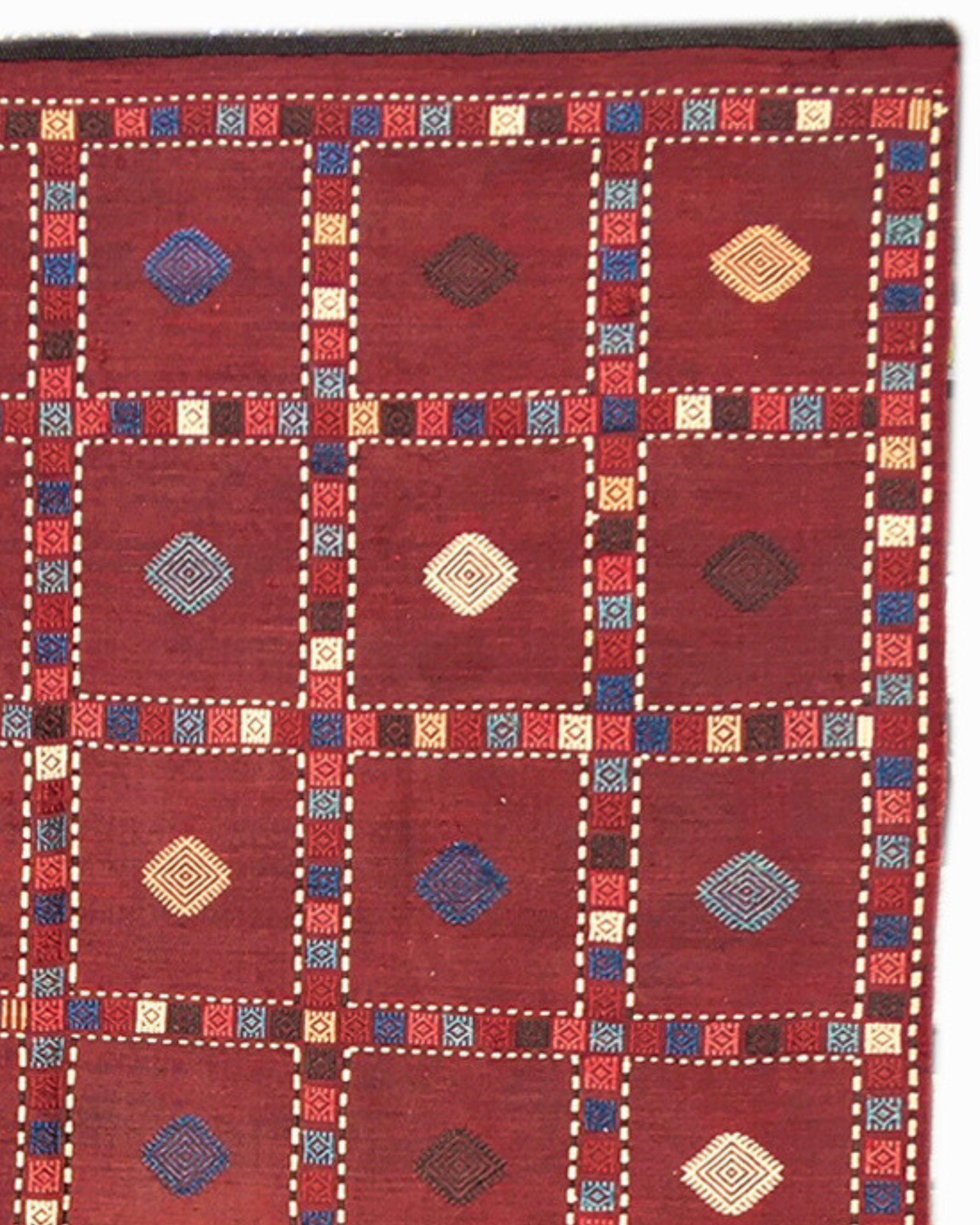 Antique Caucasian Zili Cover, Late 19th Century

This large flat-woven Caucasian Zili cover was most likely woven in the Karabagh region. Using a dark black wool warp and madder-red wool weft, a deep Kilim ground is created. Supplementary wrapping