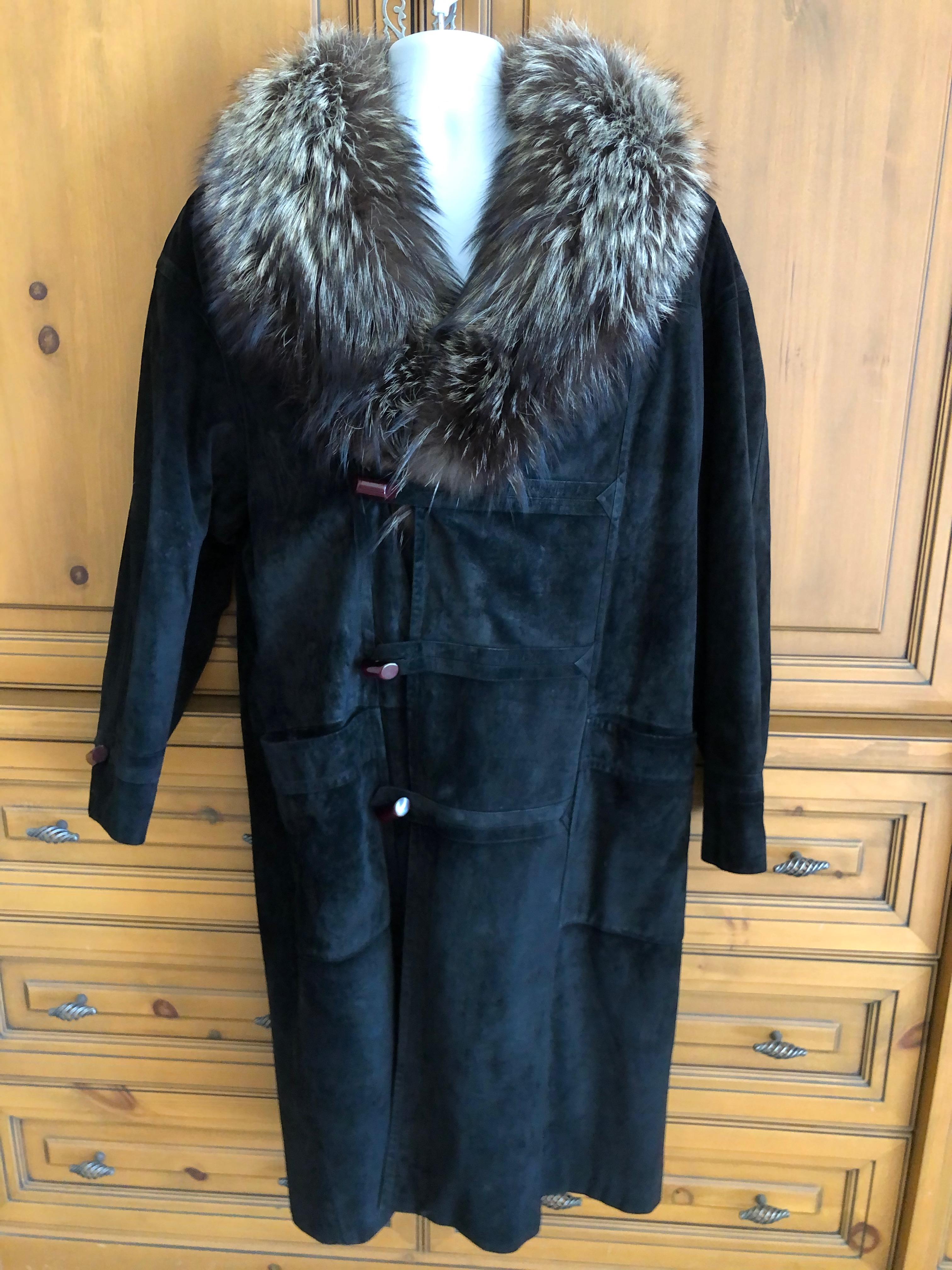 Zilli France Fur Lined Suede Toggle Coat with Wide Fox Collar.
This is so luxurious, fully lined in soft squirrel, with a wide fox collar.
In great pre owned condition, suede doesn't photograph well but it is in really  great condition.
Size